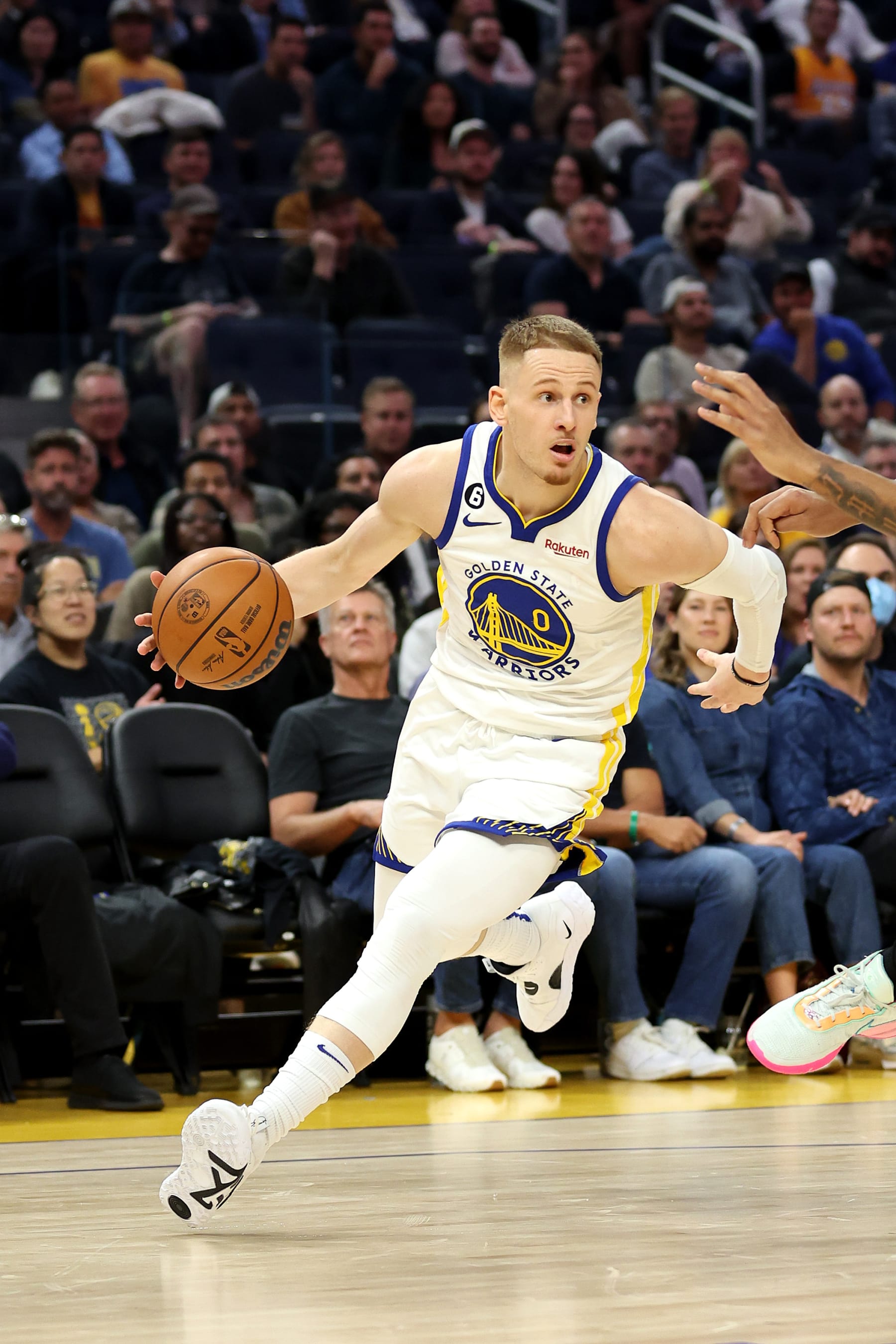 SAN FRANCISCO, CALIFORNIA - OCTOBER 18: Donte DiVincenzo #0 of the Golden State Warriors dribbles the ball during their game against the Los Angeles Lakers at Chase Center on October 18, 2022 in San Francisco, California. NOTE TO USER: User expressly acknowledges and agrees that, by downloading and or using this photograph, User is consenting to the terms and conditions of the Getty Images License Agreement. (Photo by Ezra Shaw/Getty Images)