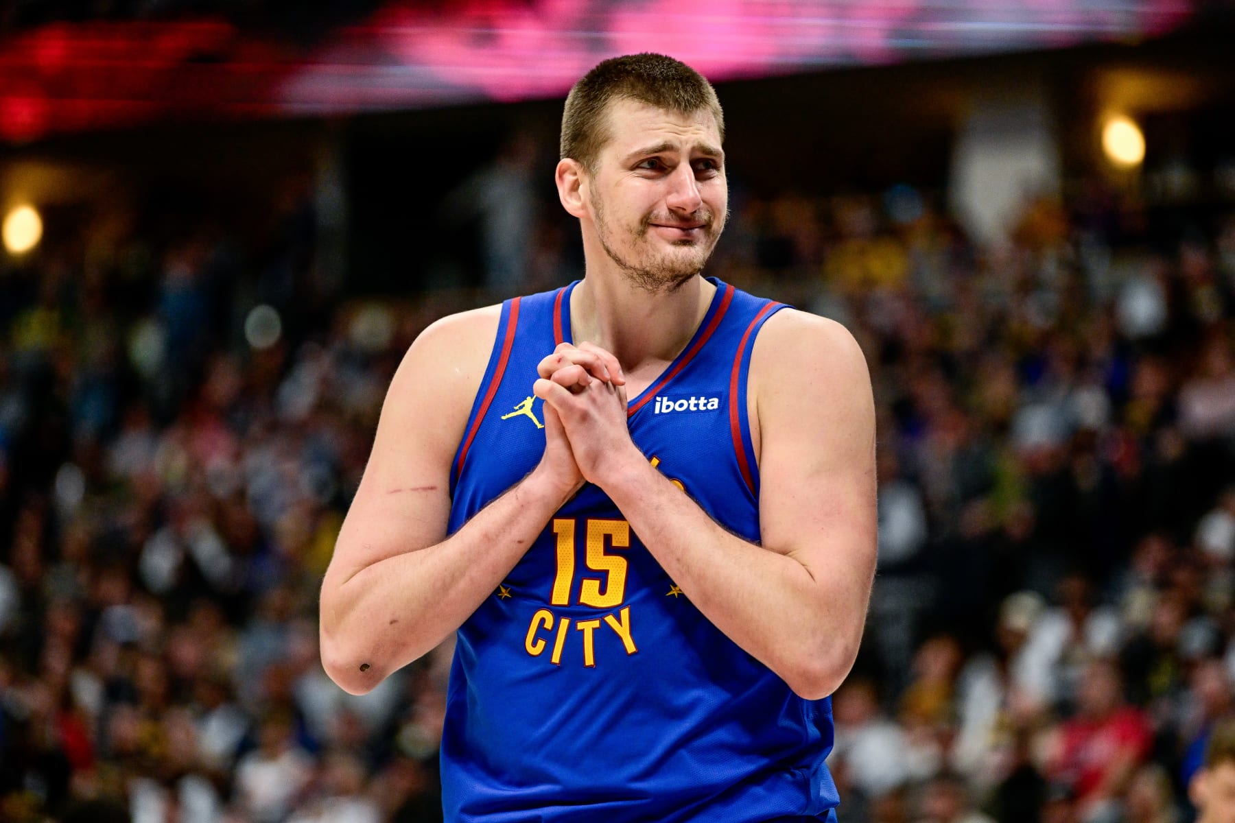 DENVER, COLORADO - MARCH 9: Nikola Jokic #15 of the Denver Nuggets reacts to a referee decision in the second half of a game against the Utah Jazz at Ball Arena on March 9, 2024 in Denver, Colorado. (Photo by Dustin Bradford/Getty Images)