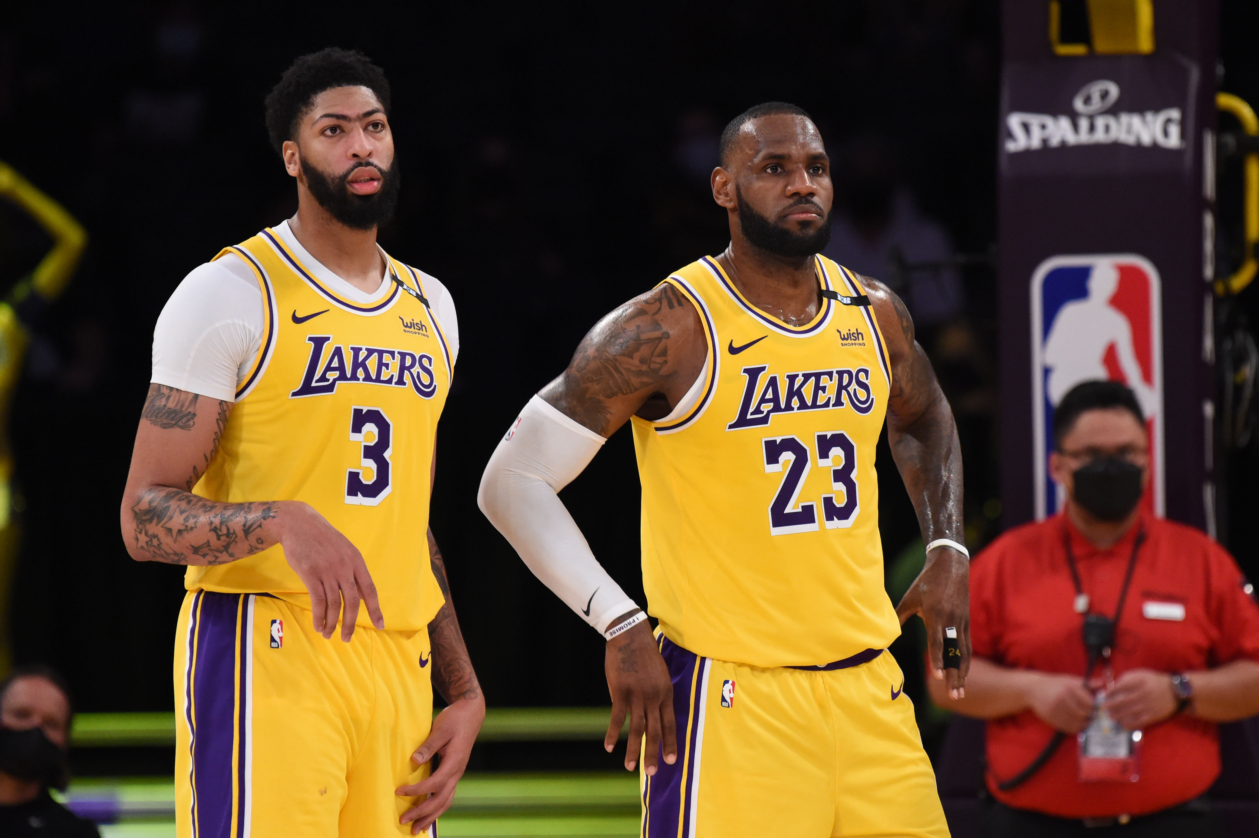 LOS ANGELES, CA - MAY 19: Anthony Davis #3 and LeBron James #23 of the Los Angeles Lakers looks on during the 2021 NBA Play-In Tournament on May 19, 2021 at STAPLES Center in Los Angeles, California. NOTE TO USER: User expressly acknowledges and agrees that, by downloading and/or using this Photograph, user is consenting to the terms and conditions of the Getty Images License Agreement. Mandatory Copyright Notice: Copyright 2021 NBAE (Photo by Juan Ocampo/NBAE via Getty Images)