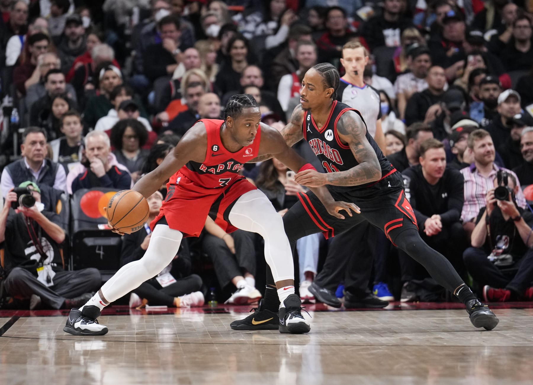 TORONTO, ON - NOVEMBER 6: O.G. Anunoby #3 of the Toronto Raptors is guarded by DeMar DeRozan #11 of the Chicago Bulls during the second half of their basketball game at the Scotiabank Arena on November 6, 2022 in Toronto, Ontario, Canada. NOTE TO USER: User expressly acknowledges and agrees that, by downloading and/or using this Photograph, user is consenting to the terms and conditions of the Getty Images License Agreement. (Photo by Mark Blinch/Getty Images)