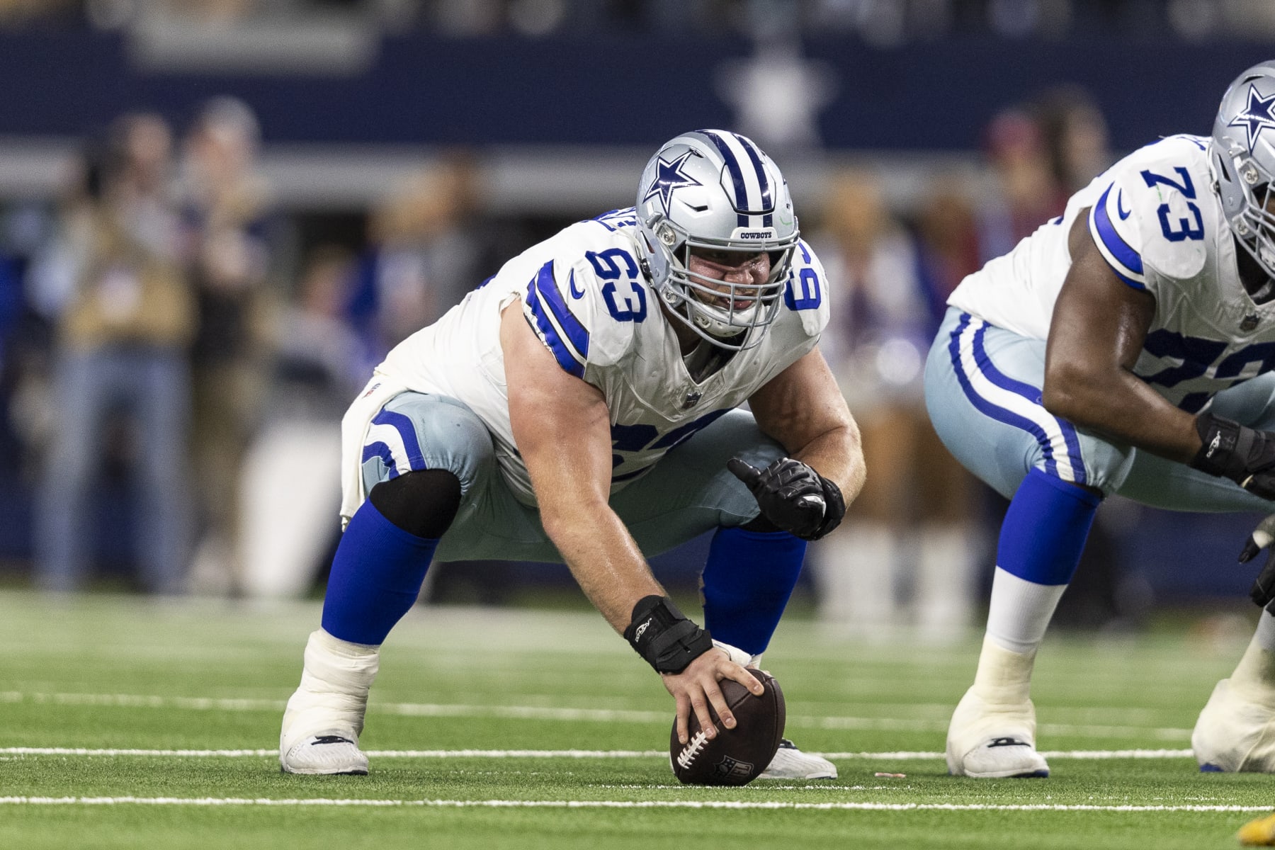 ARLINGTON, TEXAS - JANUARY 14: Tyler Biadasz #63 of the Dallas Cowboys lines up during an NFL wild-card playoff football game between the Dallas Cowboys and the Green Bay Packers at AT&T Stadium on January 14, 2024 in Arlington, Texas. (Photo by Michael Owens/Getty Images)