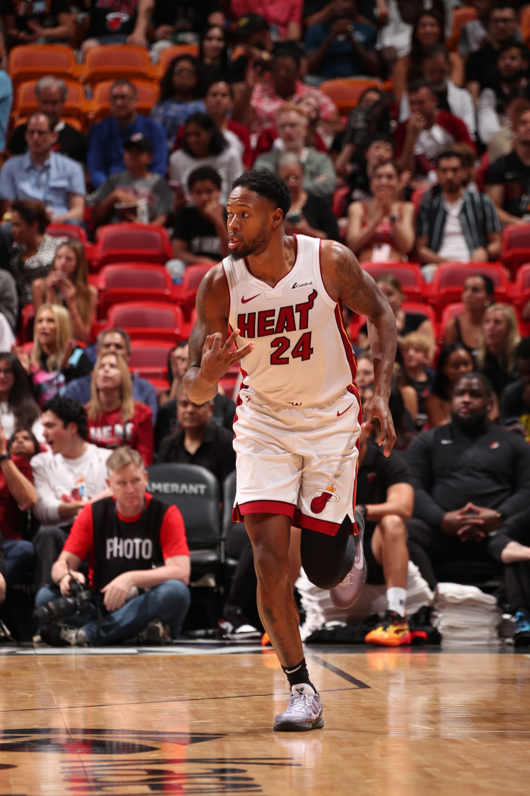 MIAMI, FL - MARCH 29: Haywood Highsmith #24 of the Miami Heat celebrates during the game against the Portland Trail Blazers on March 29, 2024 at Kaseya Center in Miami, Florida. NOTE TO USER: User expressly acknowledges and agrees that, by downloading and or using this Photograph, user is consenting to the terms and conditions of the Getty Images License Agreement. Mandatory Copyright Notice: Copyright 2024 NBAE (Photo by Issac Baldizon/NBAE via Getty Images)