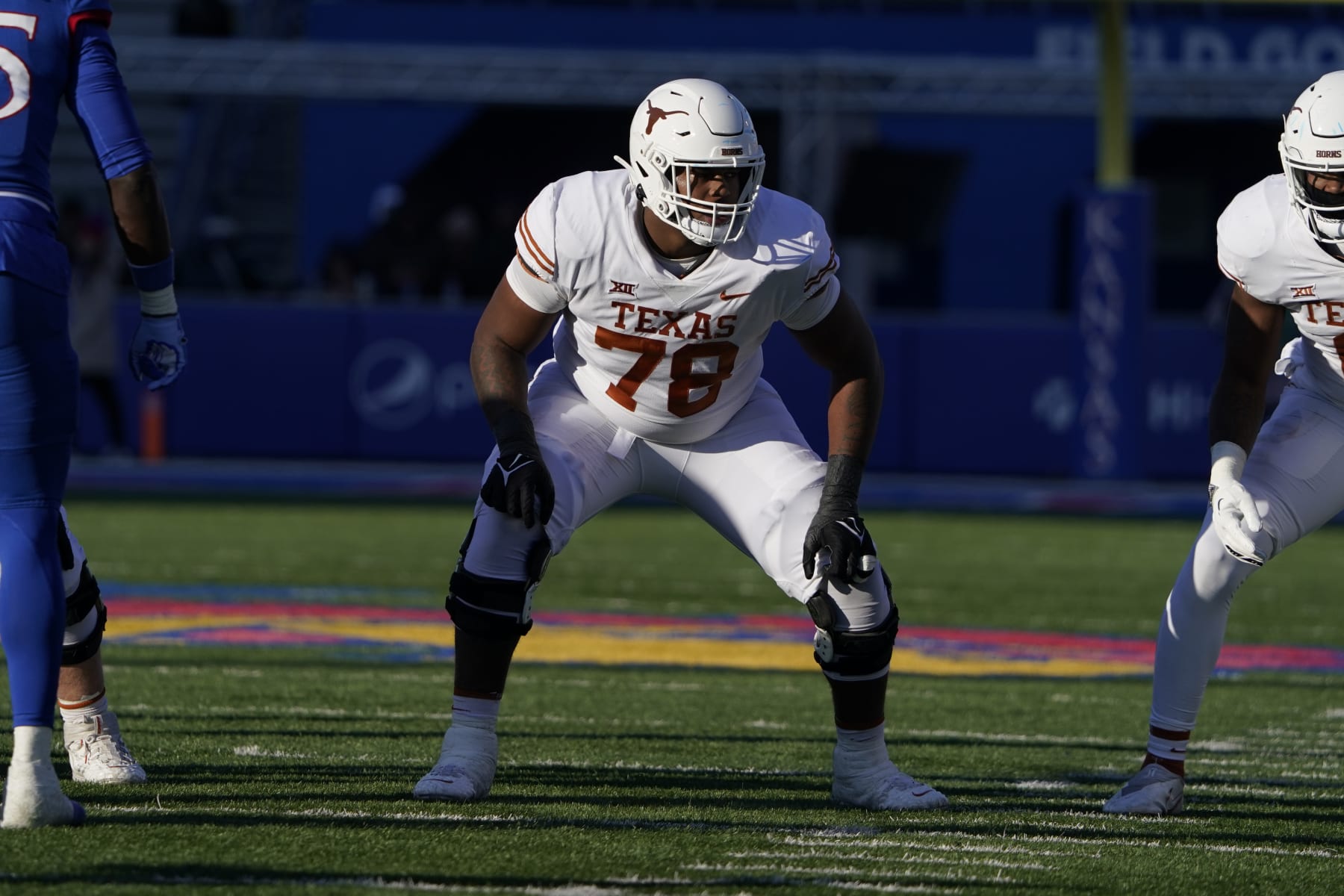 LAWRENCE, KANSAS - NOVEMBER 19: Offensive lineman Kelvin Banks Jr. #78 of the Texas Longhorns  in action against the Kansas Jayhawks in the first half at David Booth Kansas Memorial Stadium on November 19, 2022 in Lawrence, Kansas. (Photo by Ed Zurga/Getty Images)