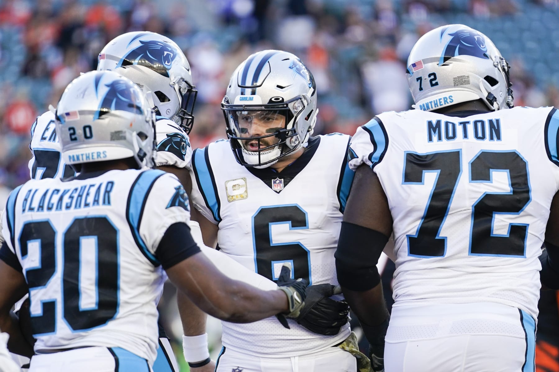 Carolina Panthers quarterback Baker Mayfield (6) huddles with the offense before a play during the second half of a NFL football game between the Cincinnati Bengals and the Carolina Panthers, Sunday, Nov. 6, 2022 in Cincinnati. (AP Photo/Joshua A. Bickel)
