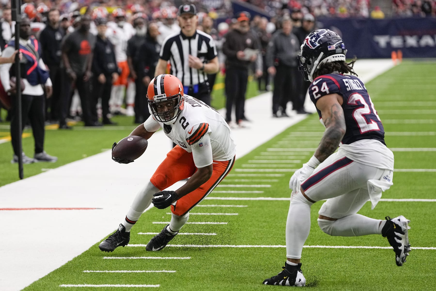 Cleveland Browns wide receiver Amari Cooper (2) catches a pass as Houston Texans cornerback Derek Stingley Jr. (24) defends during the second half of an NFL football game Sunday, Dec. 24, 2023, in Houston. (AP Photo/David J. Phillip)