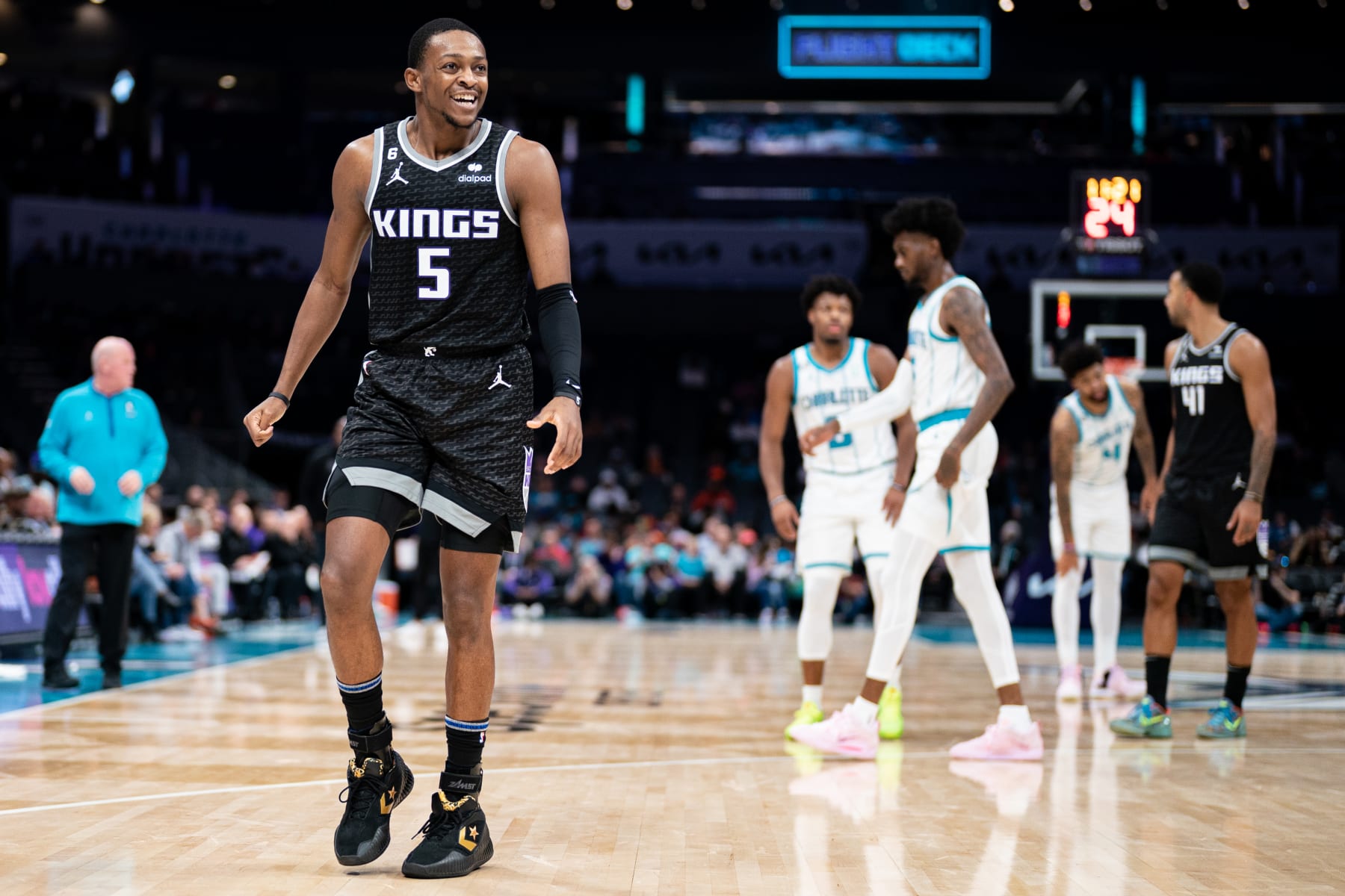 CHARLOTTE, NORTH CAROLINA - OCTOBER 31: De'Aaron Fox #5 of the Sacramento Kings reacts after being called for a foul in the second quarter during their game against the Charlotte Hornets at Spectrum Center on October 31, 2022 in Charlotte, North Carolina. (Photo by Jacob Kupferman/Getty Images) NOTE TO USER: User expressly acknowledges and agrees that, by downloading and or using this photograph, User is consenting to the terms and conditions of the Getty Images License Agreement.
