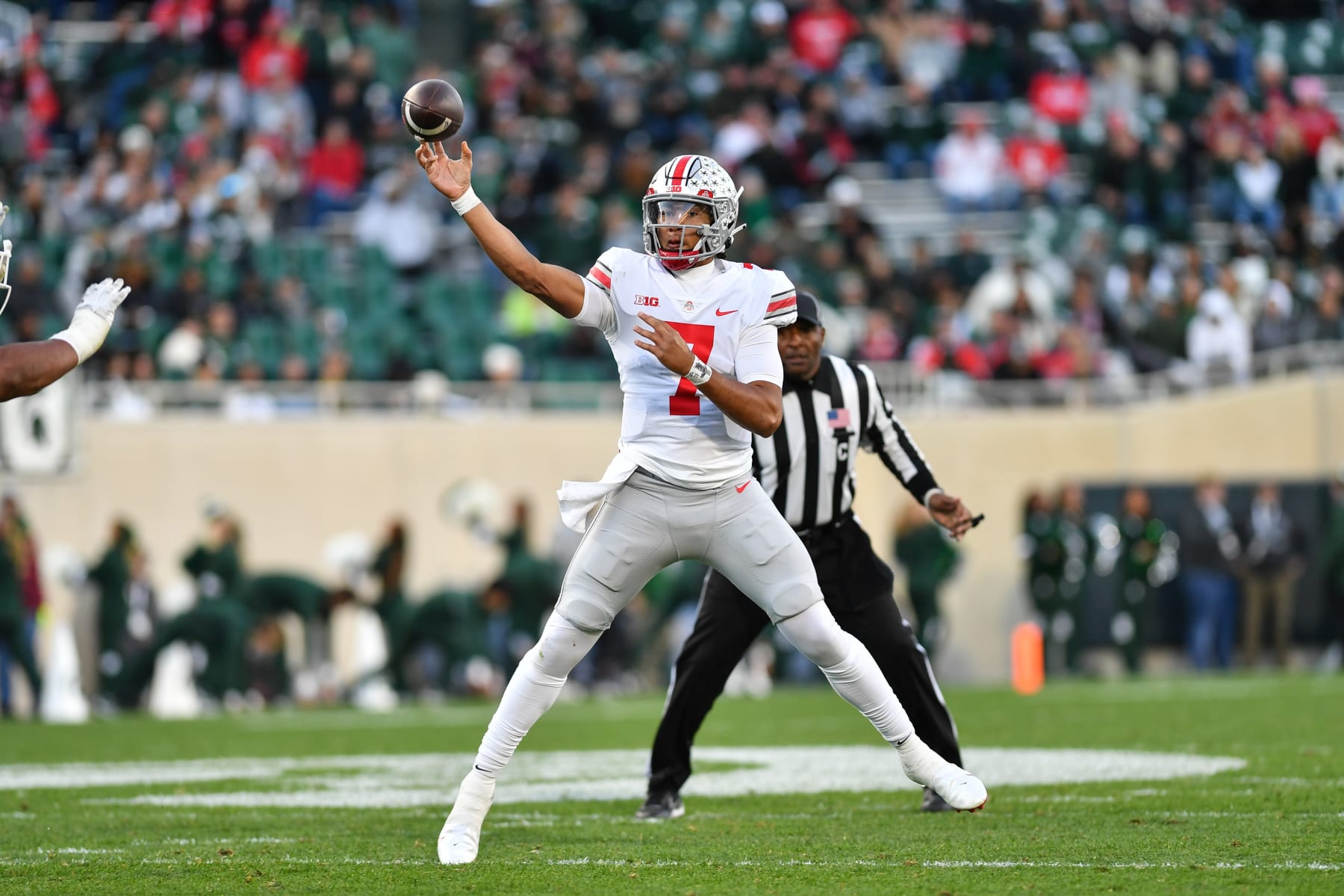 EAST LANSING, MI - OCTOBER 08: Ohio State Buckeyes quarterback C.J. Stroud (7) throws a jump pass during a college football game between the Michigan State Spartans and Ohio State Buckeyes on October 8, 2022 at Spartan Stadium in East Lansing, MI (Photo by Adam Ruff/Icon Sportswire via Getty Images)