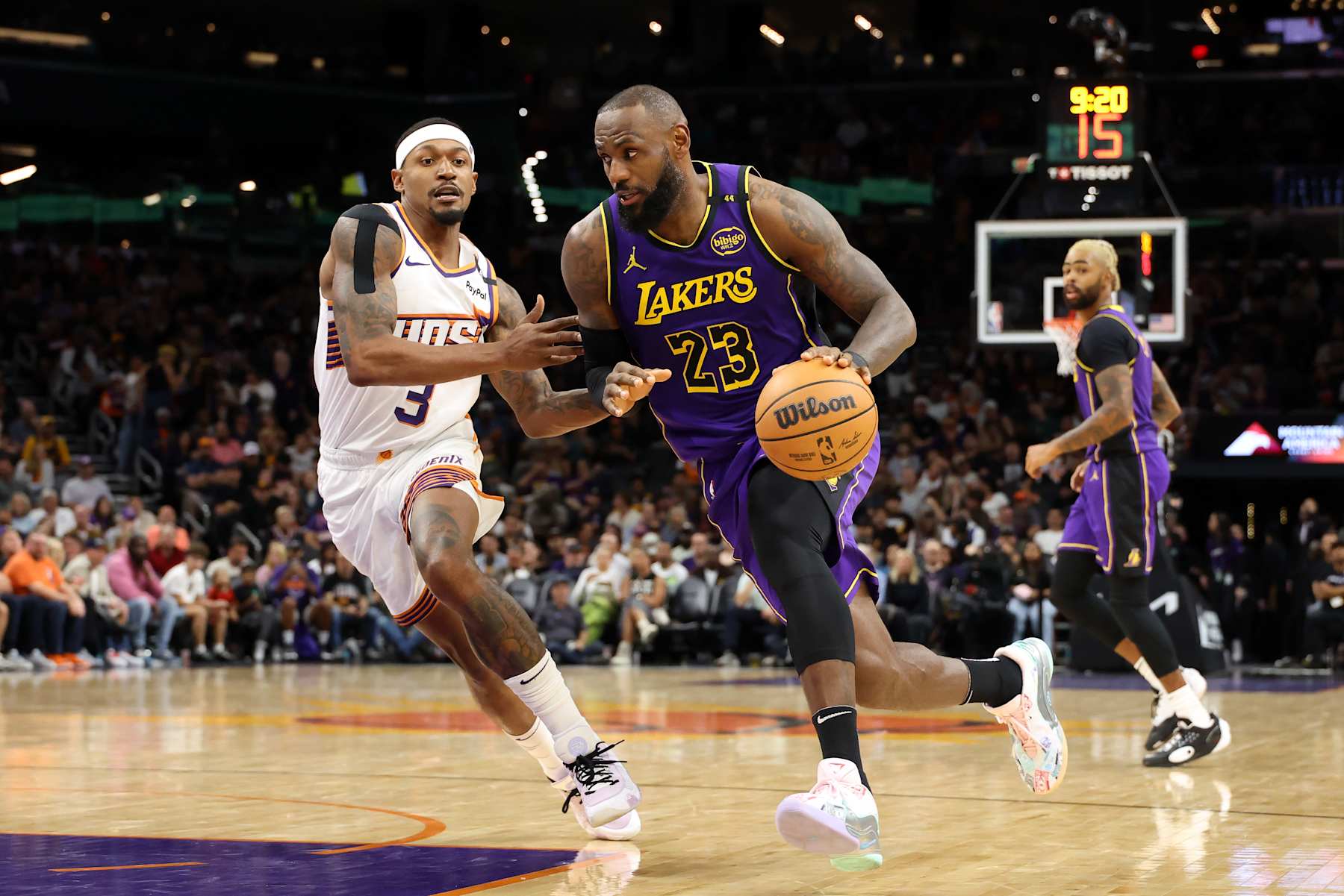 PHOENIX, ARIZONA - OCTOBER 28: LeBron James #23 of the Los Angeles Lakers drives to the basket against Bradley Beal #3 of the Phoenix Suns during the second half at Footprint Center on October 28, 2024 in Phoenix, Arizona. NOTE TO USER: User expressly acknowledges and agrees that, by downloading and or using this photograph, User is consenting to the terms and conditions of the Getty Images License Agreement. (Photo by Christian Petersen/Getty Images)