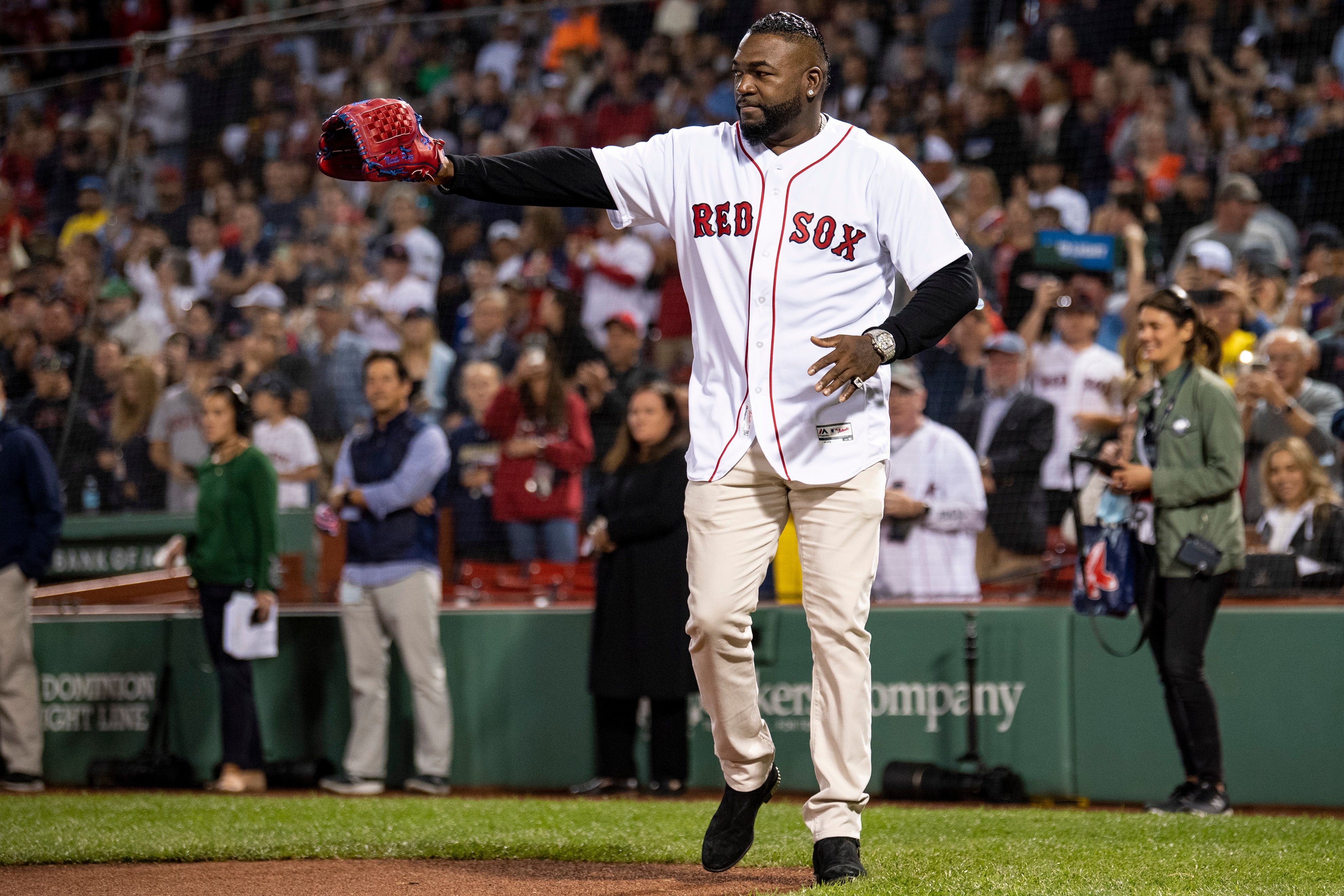 BOSTON, MA - SEPTEMBER 26: Former Boston Red Sox designated hitter David Ortiz is introduced before catching a ceremonial first pitch from the family of fallen Sergeant Johanny Rosario Pichardo before a game between the Boston Red Sox and the New York Yankees on September 26, 2021 at Fenway Park in Boston, Massachusetts. (Photo by Billie Weiss/Boston Red Sox/Getty Images)