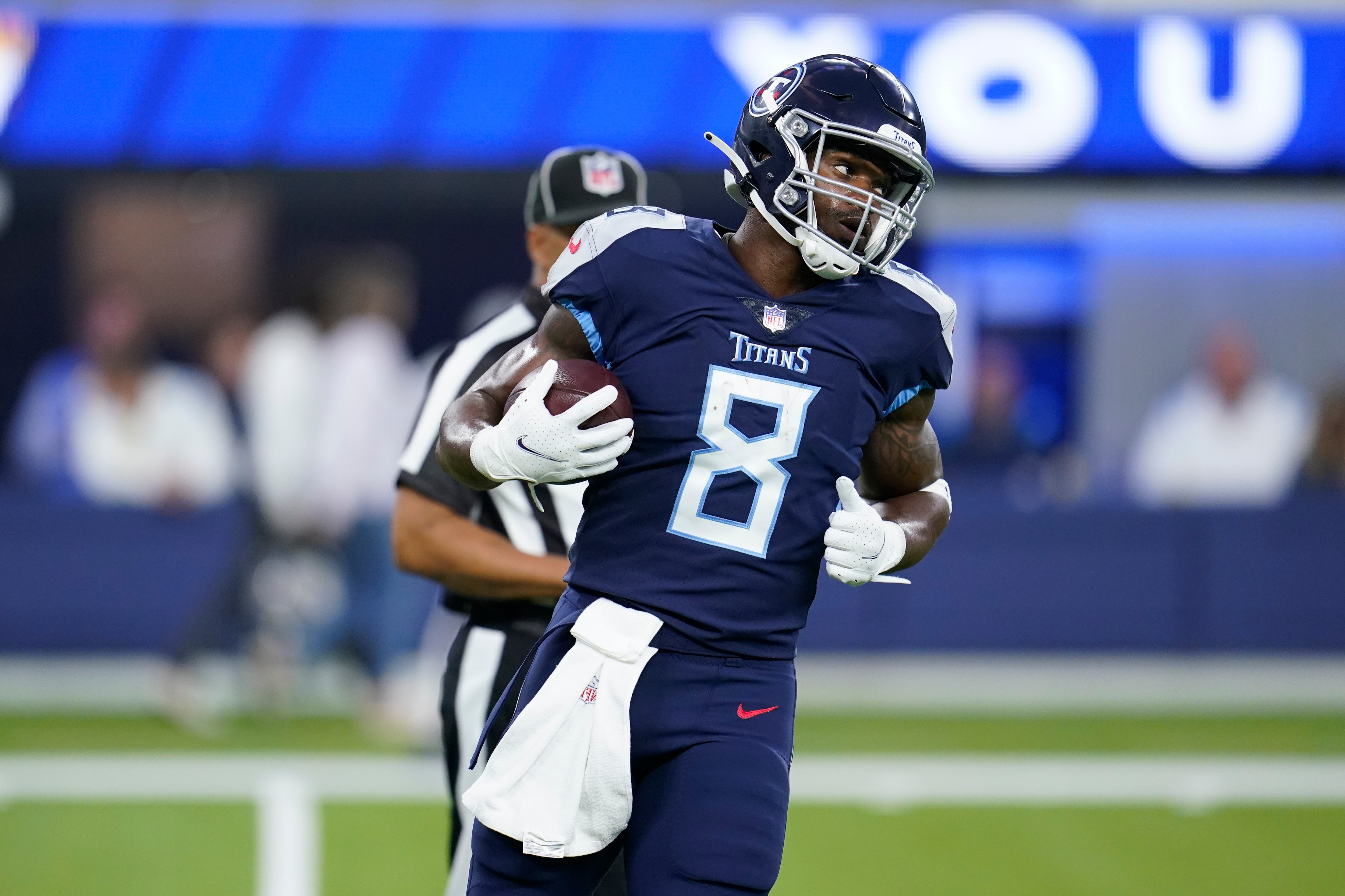 Tennesse Titans running back Adrian Peterson warms up before an NFL football game against the Los Angeles Rams, Sunday, Nov. 7, 2021, in Inglewood, Calif. (AP Photo/Marcio Jose Sanchez)
