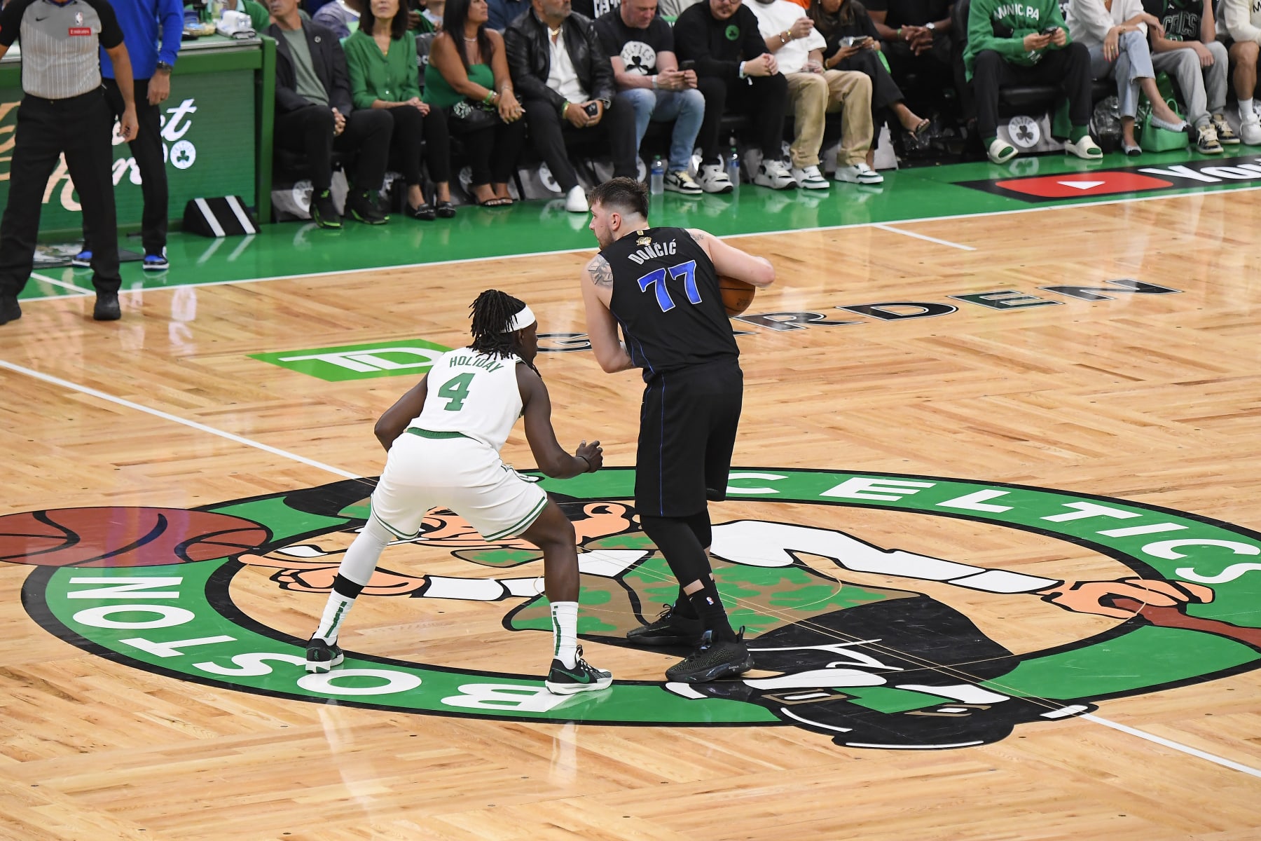 Jrue Holiday and Luka DonÄiÄ