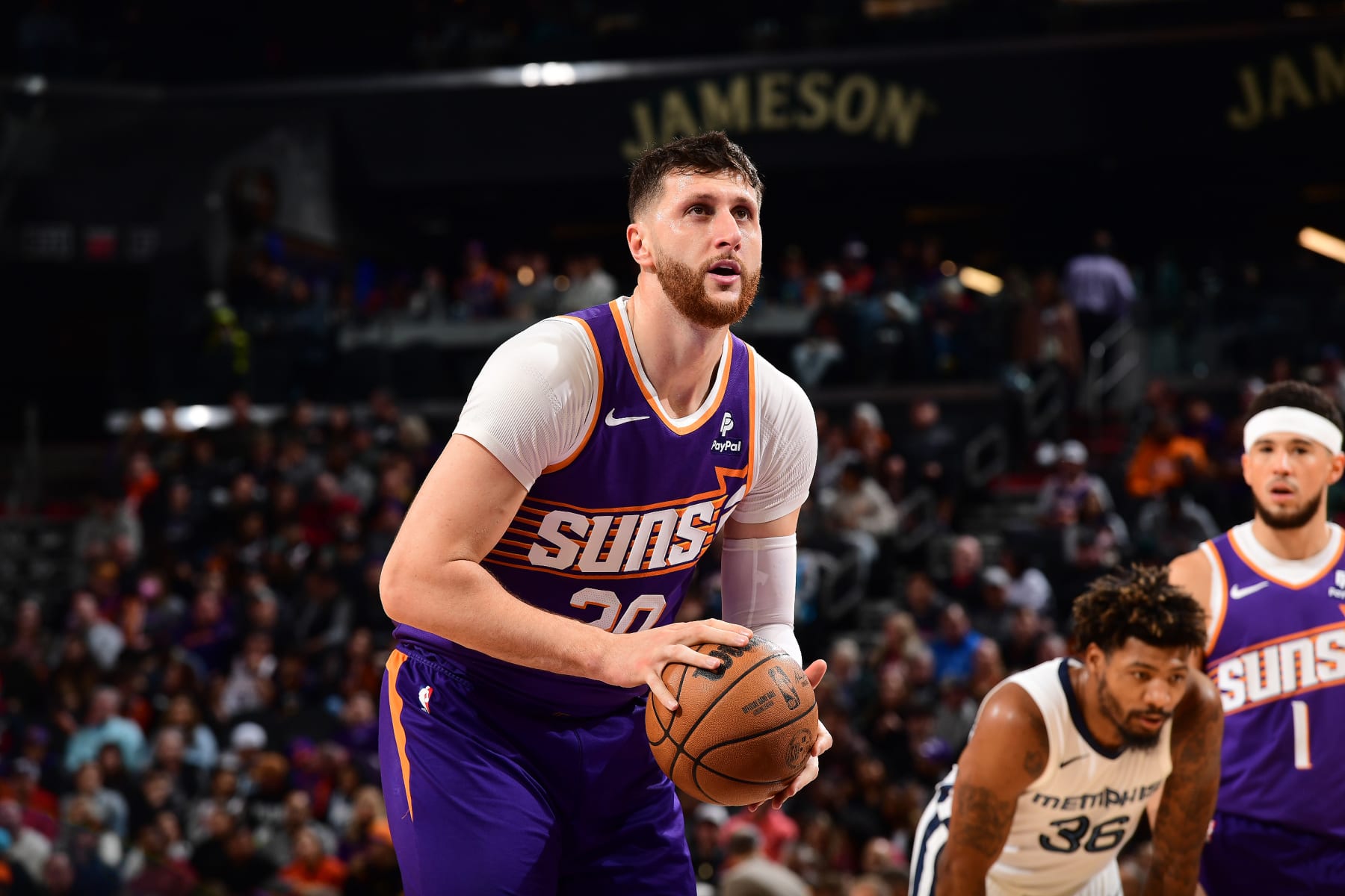 Jusuf NurkiÄ, Marcus Smart and Devin Booker