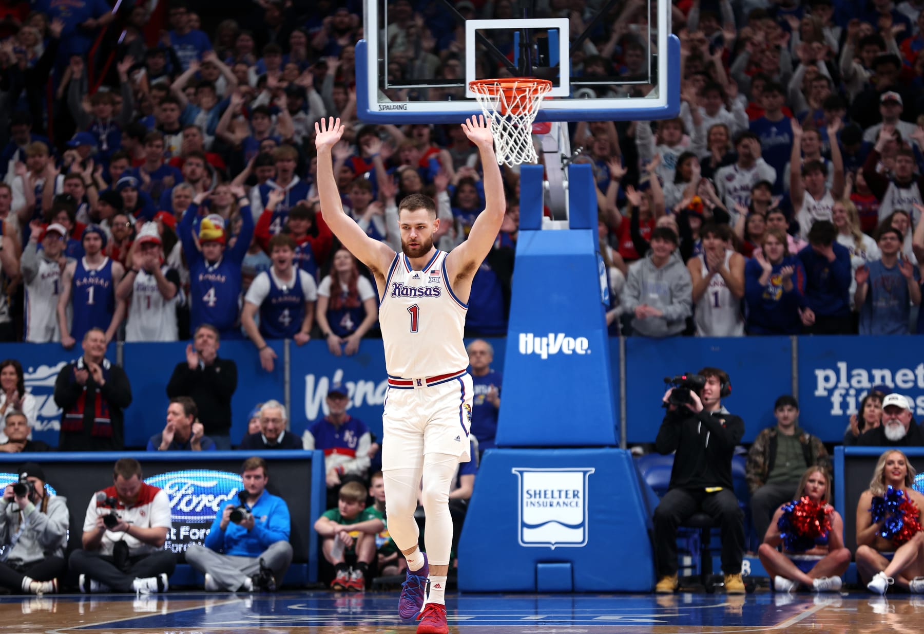 LAWRENCE, KANSAS - JANUARY 13:  Hunter Dickinson #1 of the Kansas Jayhawks reacts after scoring during the 1st half of the game against the Oklahoma Sooners at Allen Fieldhouse on January 13, 2024 in Lawrence, Kansas. (Photo by Jamie Squire/Getty Images)