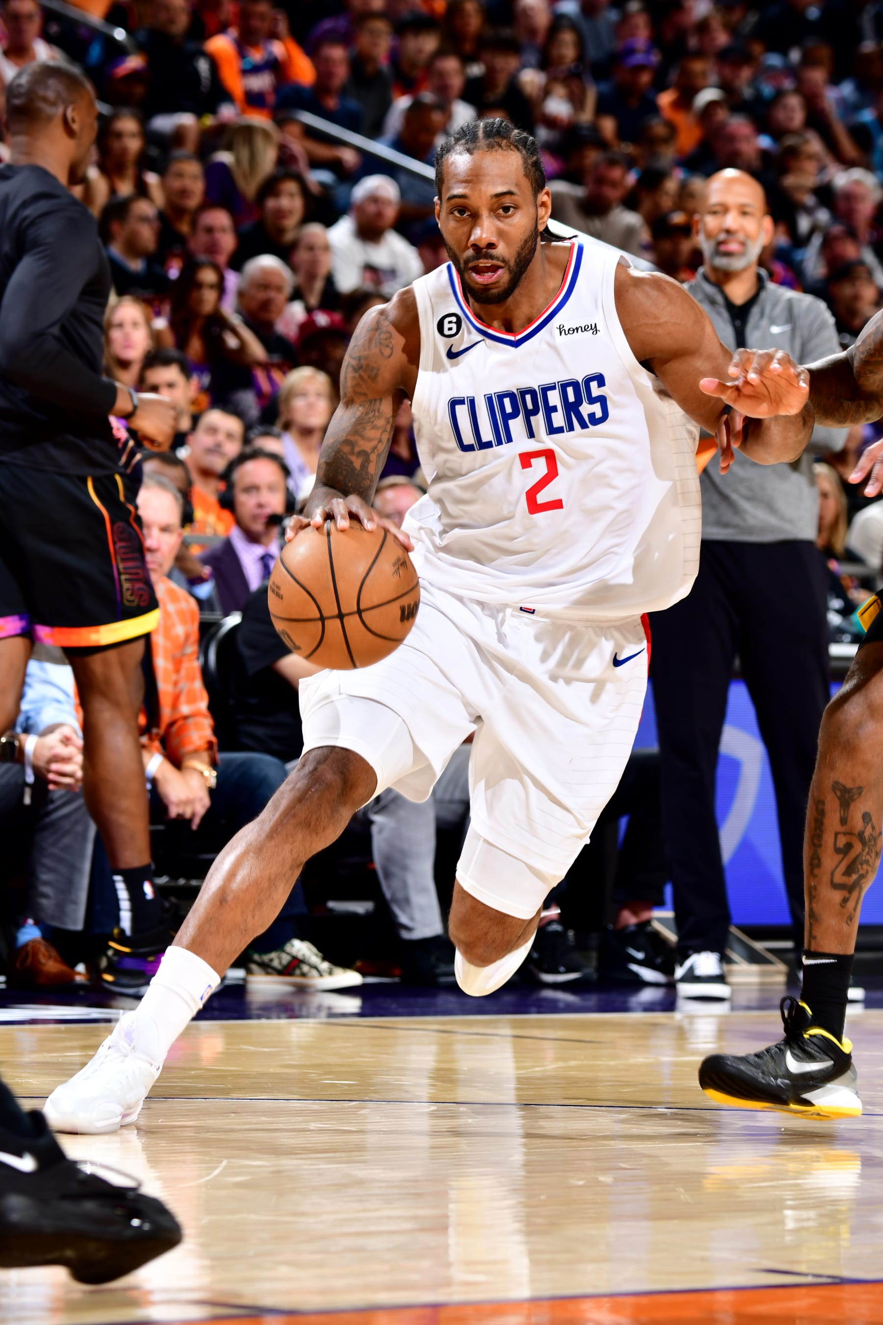 PHOENIX, AZ - APRIL 18: Kawhi Leonard #2 of the LA Clippers dribbles the ball during the game against the Phoenix Suns during Round 1 Game 2 of the 2023 NBA Playoffs on April 18, 2023 at Footprint Center in Phoenix, Arizona. NOTE TO USER: User expressly acknowledges and agrees that, by downloading and or using this photograph, user is consenting to the terms and conditions of the Getty Images License Agreement. Mandatory Copyright Notice: Copyright 2023 NBAE (Photo by Barry Gossage/NBAE via Getty Images)