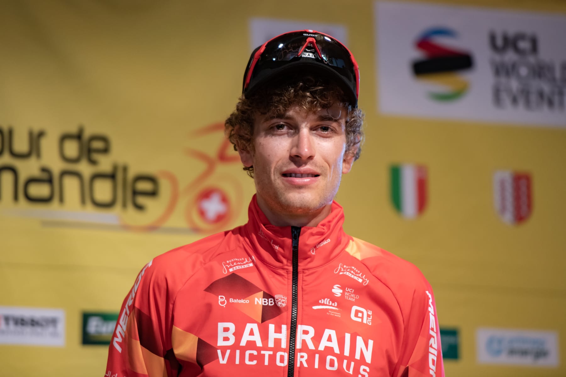 VILLARS-SUR-OLLON, SWITZERLAND - MAY 01: Gino Mader of Switzerland and Team Bahrain Victorious takes the pose for a picture after press conference after the 75th Tour De Romandie 2022 - Stage 5 on May 1, 2022 in Villars-sur-Ollon, Switzerland. (Photo by RvS.Media/Basile Barbey/Getty Images,)