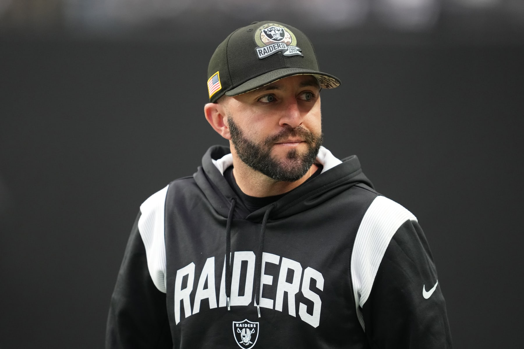 LAS VEGAS, NEVADA - DECEMBER 04: Offensive Coordinator Mick Lombardi of the Las Vegas Raiders looks on prior to the game against the Los Angeles Chargers at Allegiant Stadium on December 04, 2022 in Las Vegas, Nevada. (Photo by Chris Unger/Getty Images)
