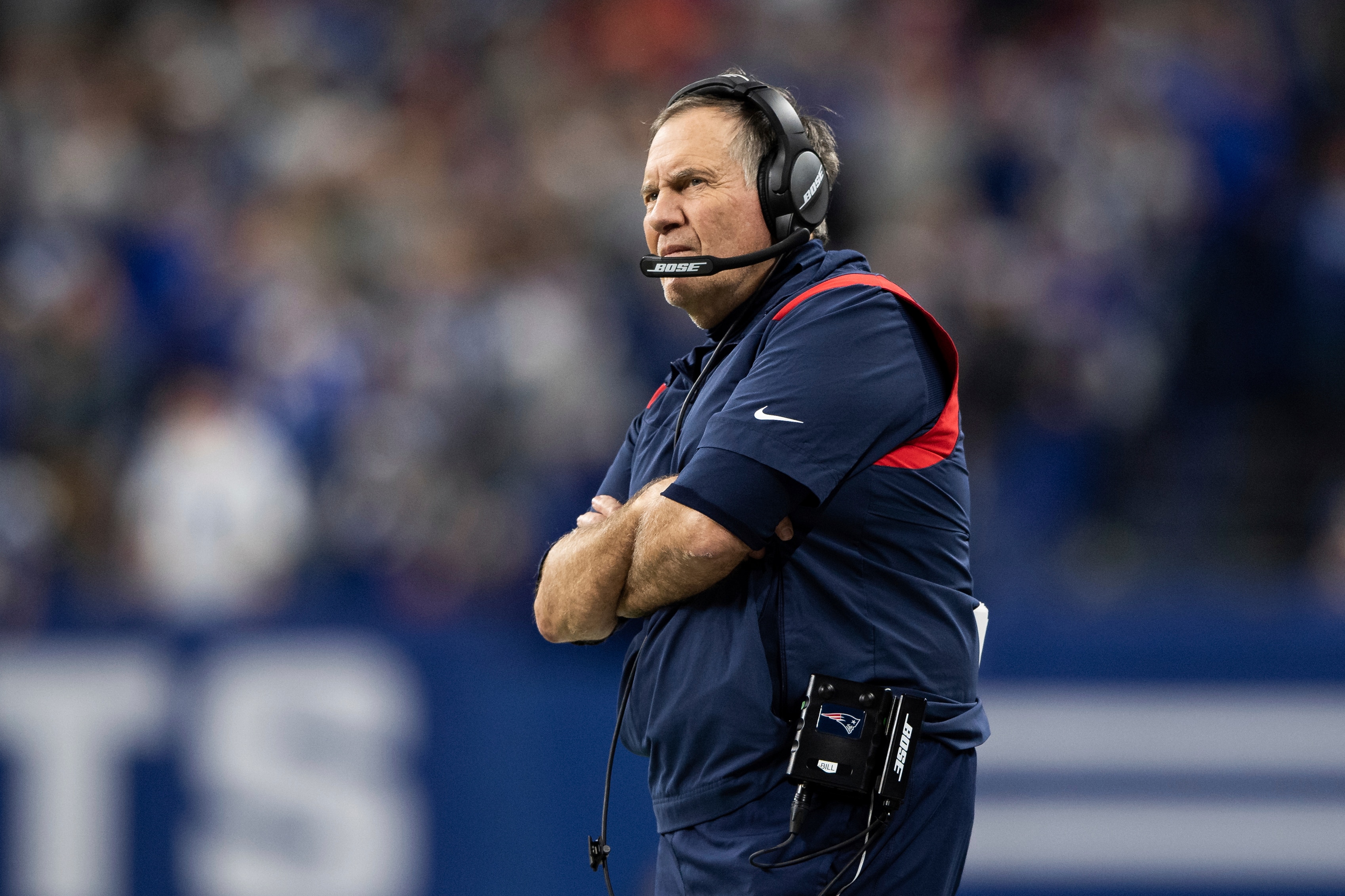 New England Patriots head coach Bill Belichick on the sidelines during an NFL football game against the Indianapolis Colts, Saturday, Dec. 18, 2021, in Indianapolis. (AP Photo/Zach Bolinger)