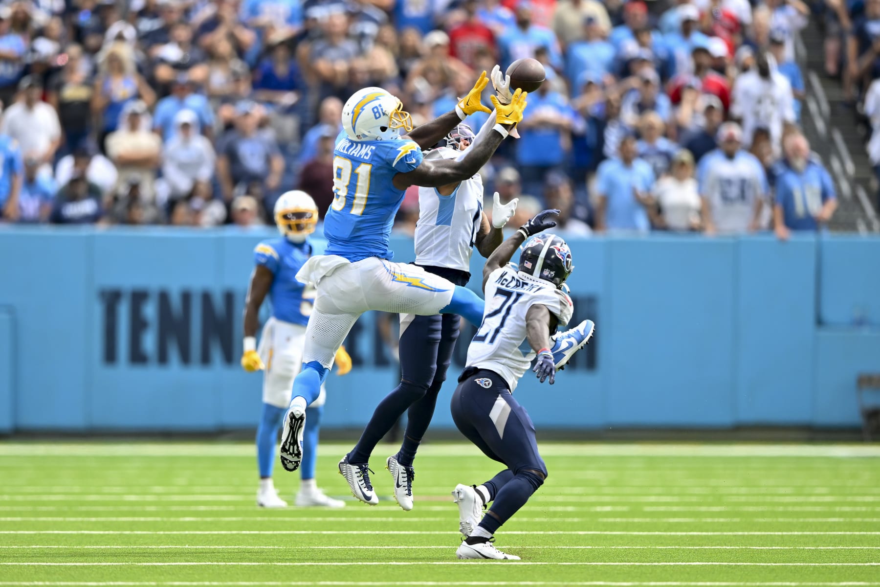 NASHVILLE, TENNESSEE - SEPTEMBER 17: Sean Murphy-Bunting #0 of the Tennessee Titans bats the ball away from Mike Williams #81 of the Los Angeles Chargers during an NFL football game at Nissan Stadium on September 17, 2023 in Nashville, Tennessee. The Tennessee Titans won 27-24 in overtime. (Photo by Alika Jenner/Getty Images)