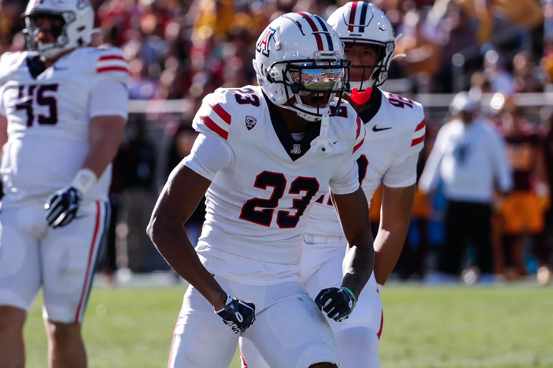 TEMPE, AZ - NOVEMBER 25:  Arizona Wildcats cornerback Tacario Davis (23) reacts after a big play during the college football game between the Arizona Wildcats and the Arizona State Sun Devils on November 25, 2023 at Mountain America Stadium in Tempe, Arizona. (Photo by Kevin Abele/Icon Sportswire via Getty Images)