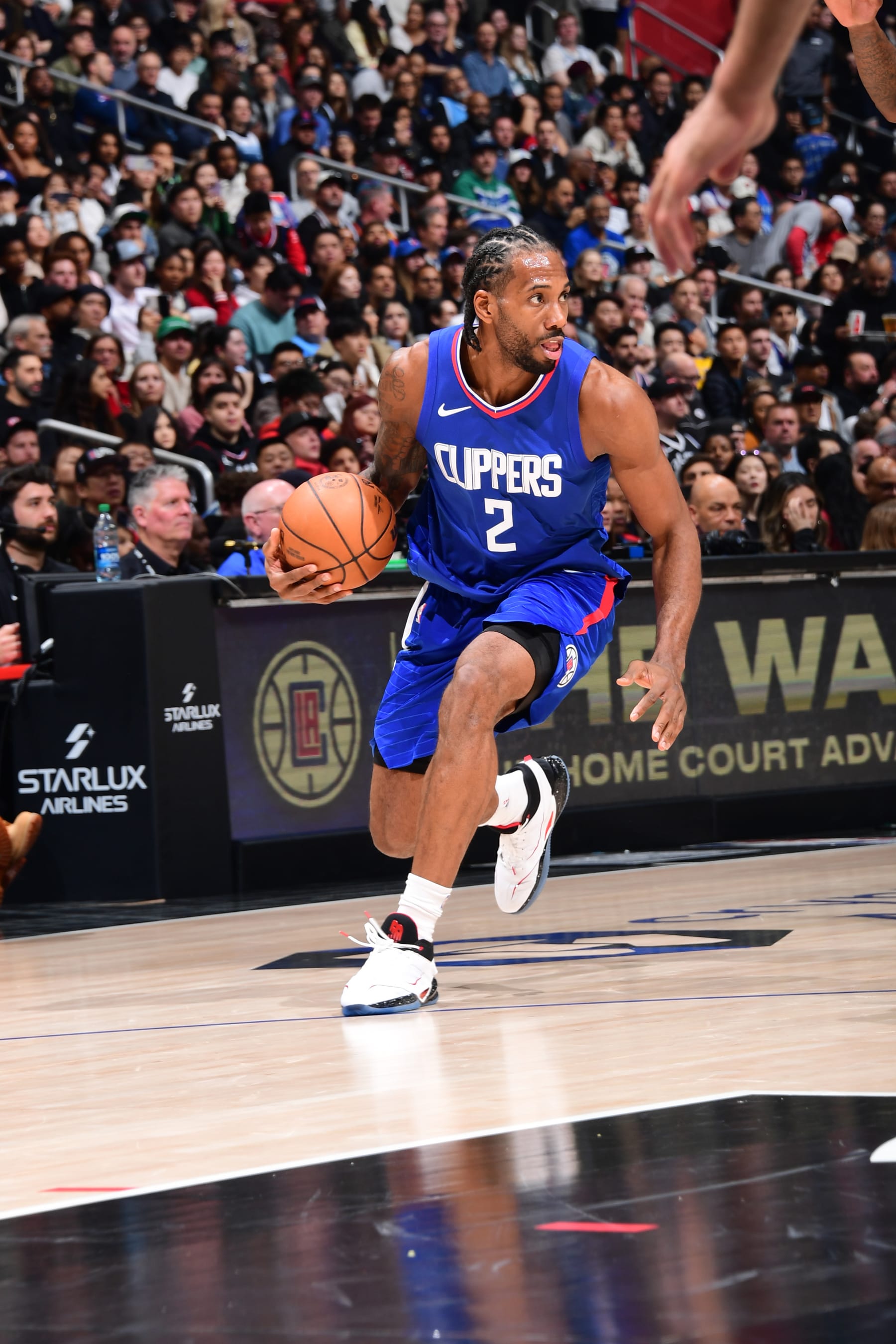 LOS ANGELES, CA - FEBRUARY 12:  Kawhi Leonard #2 of the LA Clippers handles the ball during the game  on February 12, 2024 at Crypto.Com Arena in Los Angeles, California. NOTE TO USER: User expressly acknowledges and agrees that, by downloading and/or using this Photograph, user is consenting to the terms and conditions of the Getty Images License Agreement. Mandatory Copyright Notice: Copyright 2024 NBAE (Photo by Adam Pantozzi/NBAE via Getty Images)
