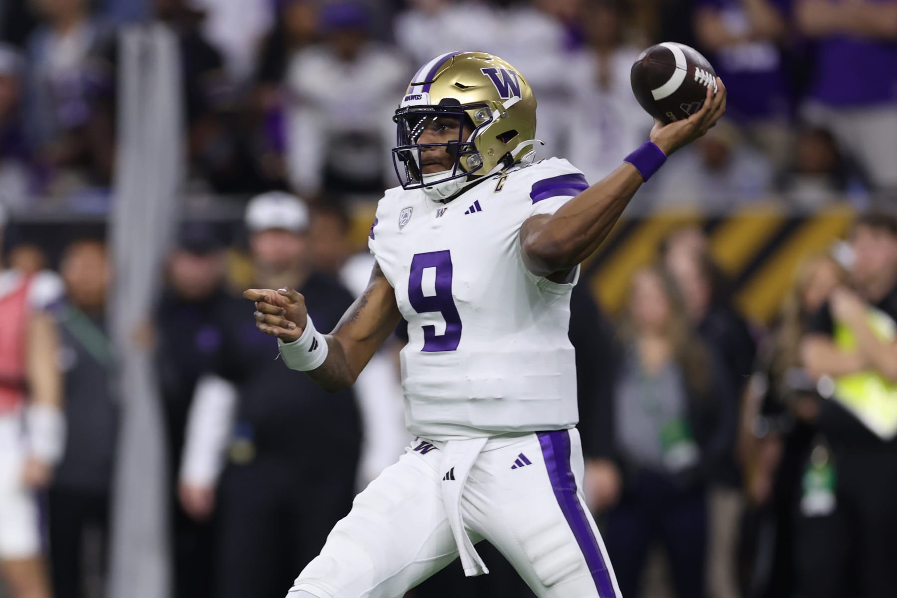 HOUSTON, TEXAS - JANUARY 08: Michael Penix Jr. #9 of the Washington Huskies throws the ball in the second half against the Michigan Wolverines during the 2024 CFP National Championship game at NRG Stadium on January 08, 2024 in Houston, Texas. (Photo by Maddie Meyer/Getty Images)