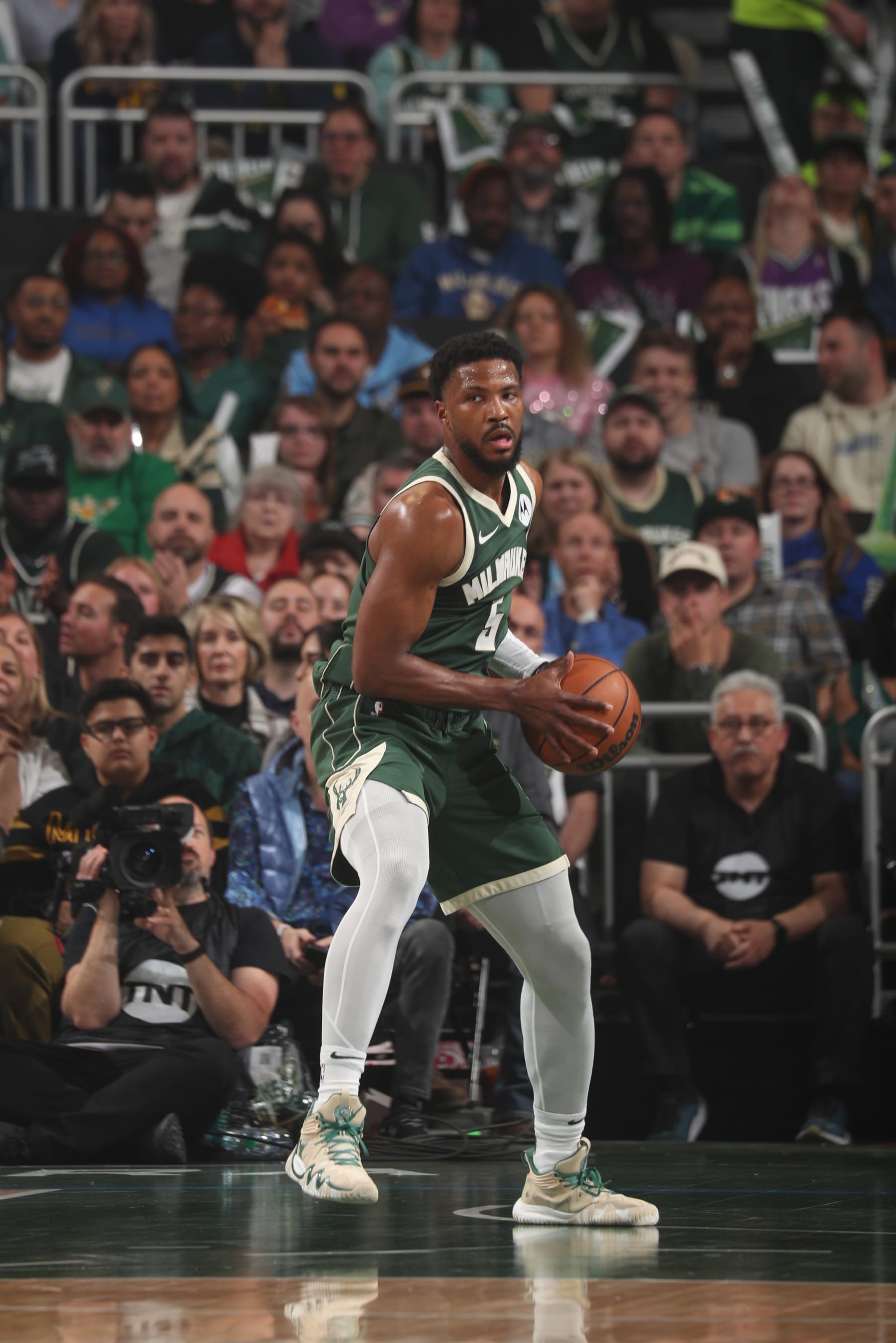 MILWAUKEE, WI - APRIL 30:  Malik Beasley #5 of the Milwaukee Bucks handles the ball during the game  against the Indiana Pacers during Round 1 Game 5 of the 2024 NBA Playoffs on April 30, 2024 at the Fiserv Forum Center in Milwaukee, Wisconsin. NOTE TO USER: User expressly acknowledges and agrees that, by downloading and or using this Photograph, user is consenting to the terms and conditions of the Getty Images License Agreement. Mandatory Copyright Notice: Copyright 2024 NBAE (Photo by Gary Dineen/NBAE via Getty Images).