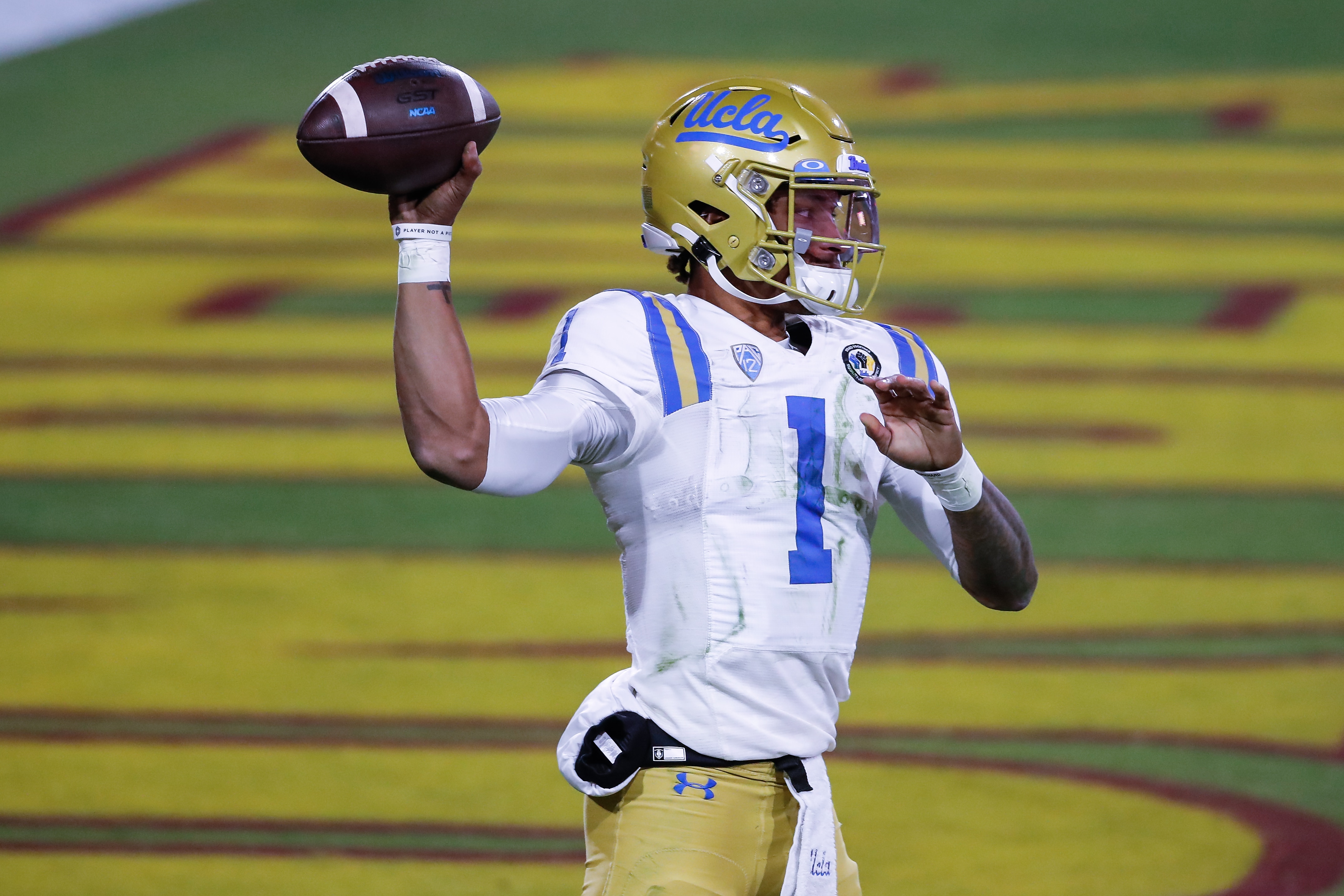 TEMPE, AZ - DECEMBER 05:  UCLA Bruins quarterback Dorian Thompson-Robinson (1) throws a pass during the college football game between the UCLA Bruins and the Arizona State Sun Devils on December 5, 2020 at Sun Devil Stadium in Tempe, Arizona. (Photo by Kevin Abele/Icon Sportswire via Getty Images)