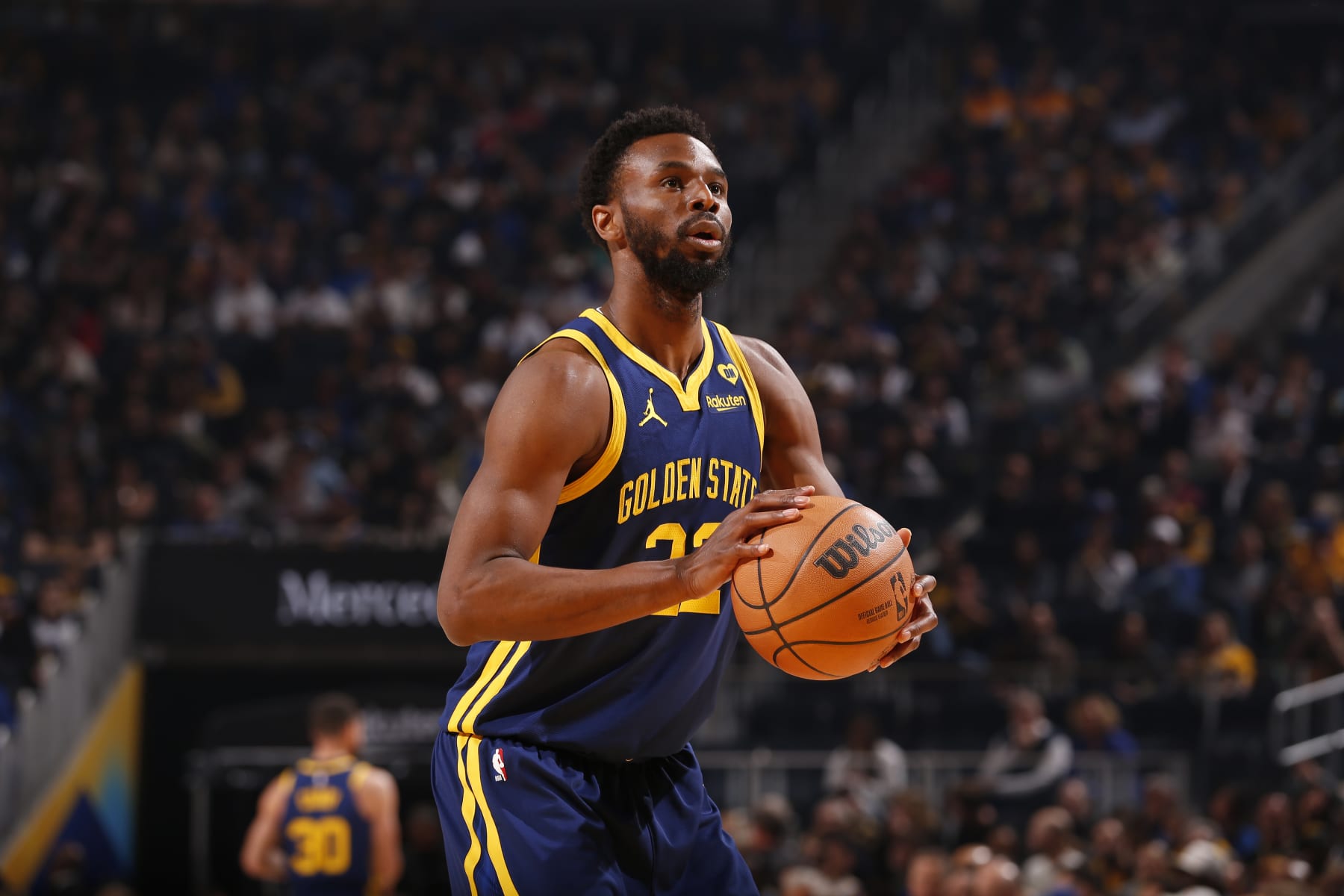 SAN FRANCISCO, CA - APRIL 12: Andrew Wiggins #22 of the Golden State Warriors shoots a free throw during the game against the New Orleans Pelicans  on April 12, 2024 at Chase Center in San Francisco, California. NOTE TO USER: User expressly acknowledges and agrees that, by downloading and or using this photograph, user is consenting to the terms and conditions of Getty Images License Agreement. Mandatory Copyright Notice: Copyright 2024 NBAE (Photo by Jed Jacobsohn/NBAE via Getty Images)