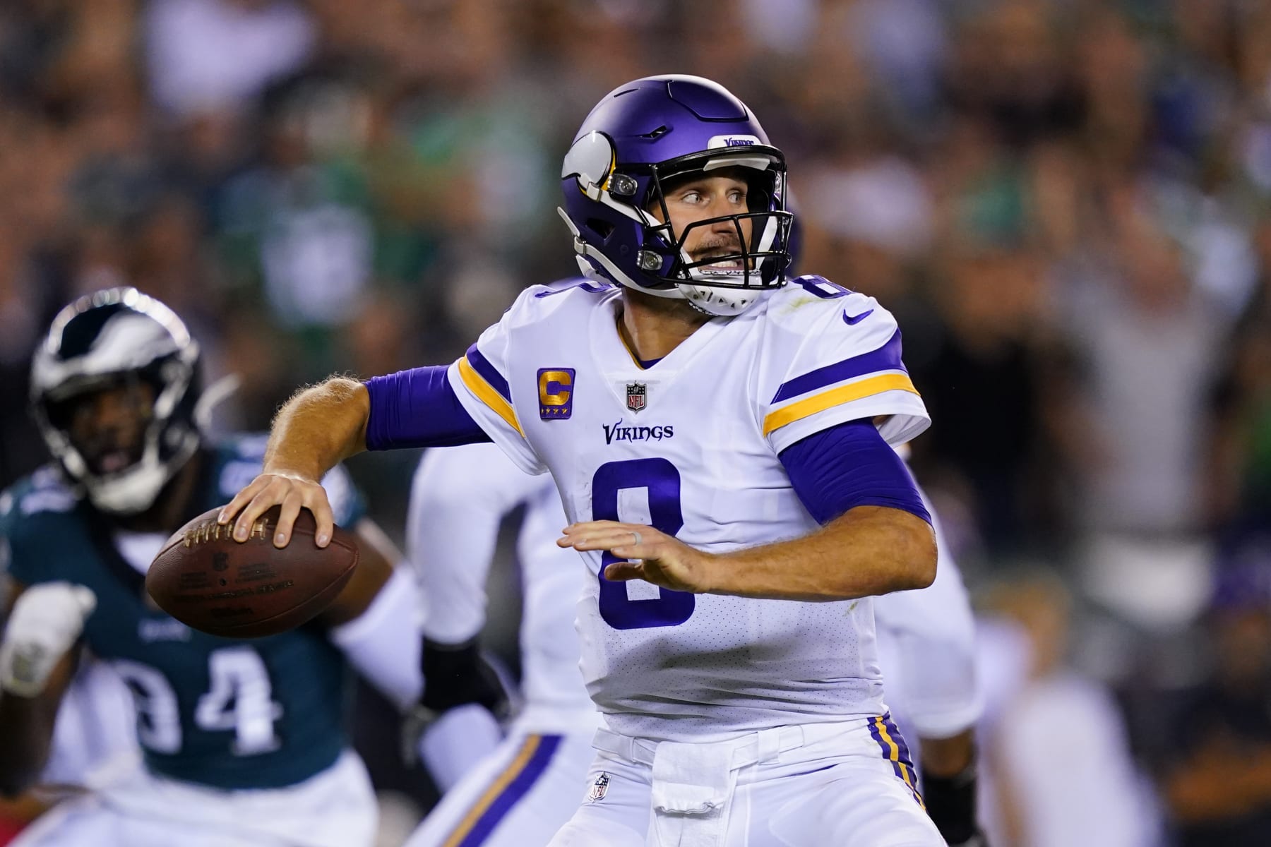 Minnesota Vikings quarterback Kirk Cousins (8) throws a pass during the first half of an NFL football game against the Philadelphia Eagles, Monday, Sept. 19, 2022, in Philadelphia. (AP Photo/Matt Slocum)