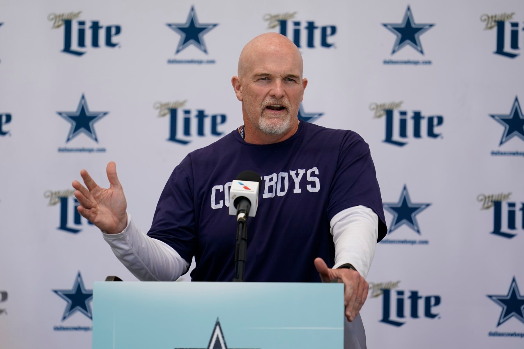 Dallas Cowboys defensive coordinator Dan Quinn speaks to reporters at the NFL football team's practice facility in Oxnard, Calif. Wednesday, Aug. 3, 2022. (AP Photo/Ashley Landis)