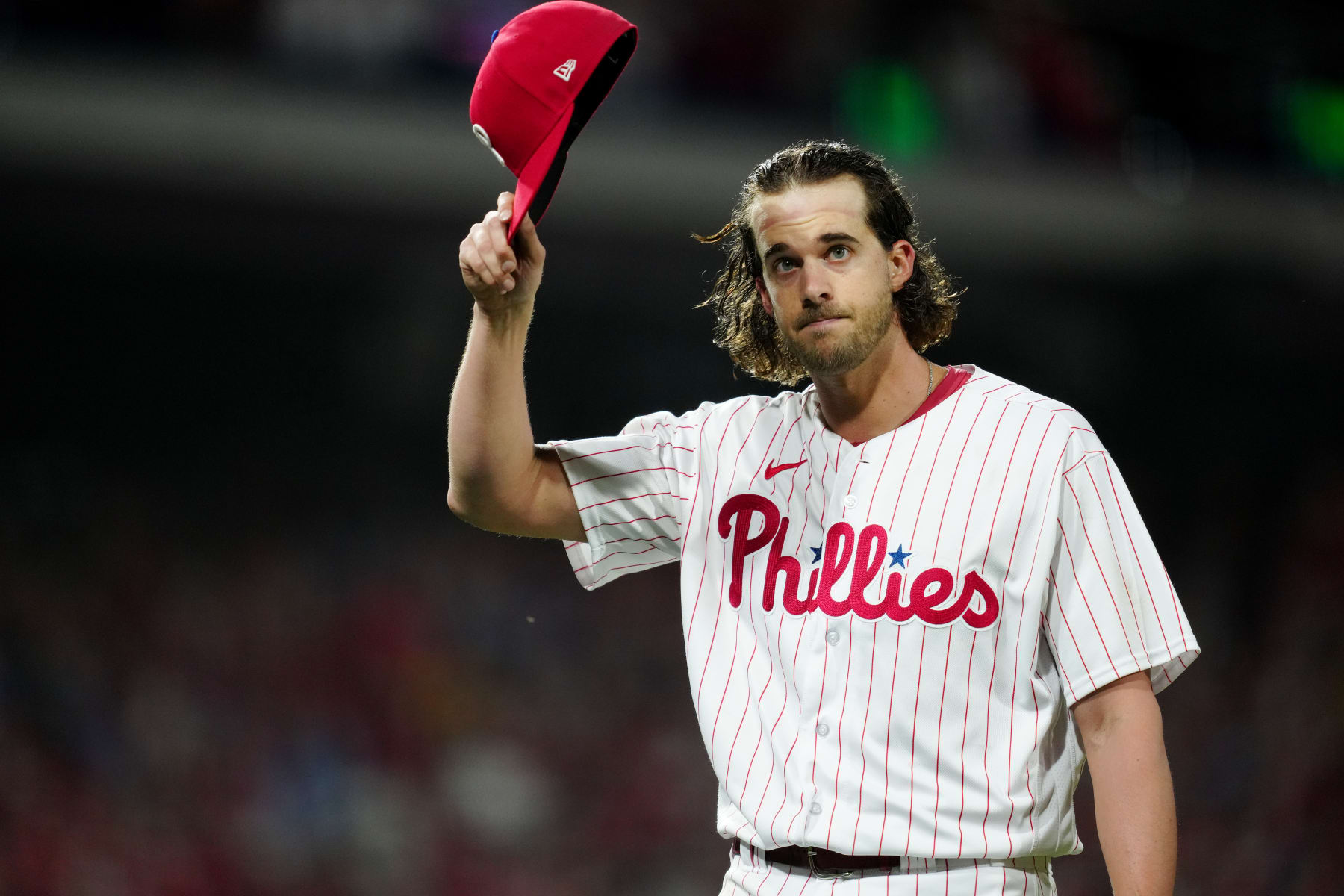 PHILADELPHIA, PA - OCTOBER 11:  Aaron Nola #27 of the Philadelphia Phillies acknowledges the crowd as he walks back to the dugout during a pitching change during Game 3 of the Division Series between the Atlanta Braves and the Philadelphia Phillies at Citizens Bank Park on Wednesday, October 11, 2023 in Philadelphia, Pennsylvania. (Photo by Mary DeCicco/MLB Photos via Getty Images)