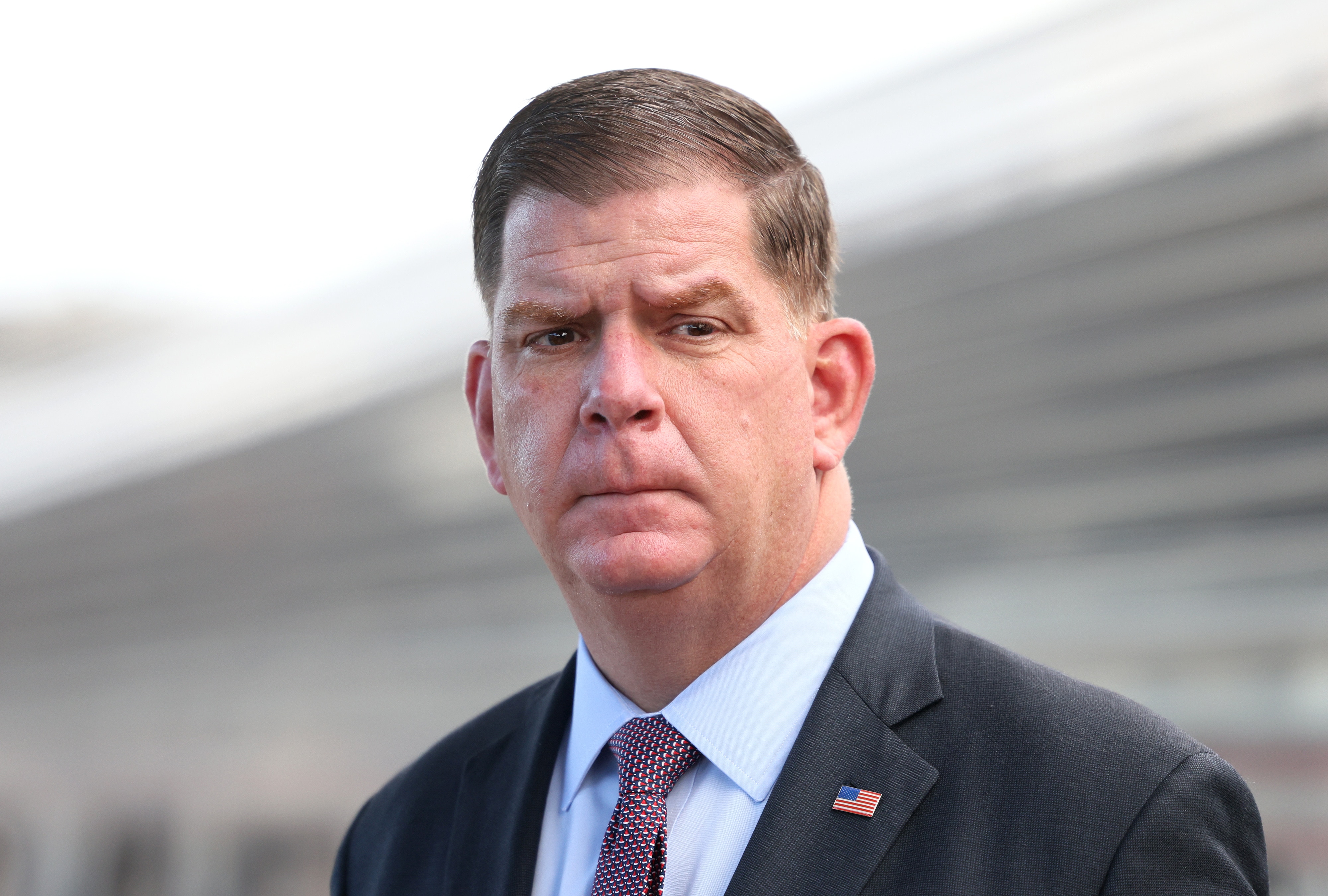 Springfield, MA - December 13: Secretary of Labor Marty Walsh listens as he is introduced at a press conference about the Bipartisan Infrastructure Law at Springfields Union Station in Springfield, MA on Dec. 13, 2021. (Photo by Jessica Rinaldi/The Boston Globe via Getty Images)