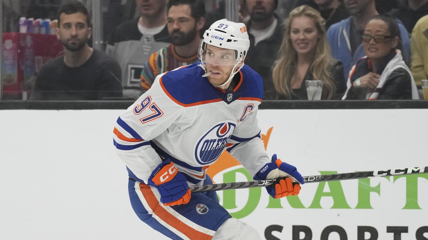 Edmonton Oilers center Connor McDavid (97) looks for the puck during Game 4 of an NHL hockey Stanley Cup first-round playoff series hockey game against the Los Angeles Kings Sunday, April 23, 2023, in Los Angeles. (AP Photo/Ashley Landis)