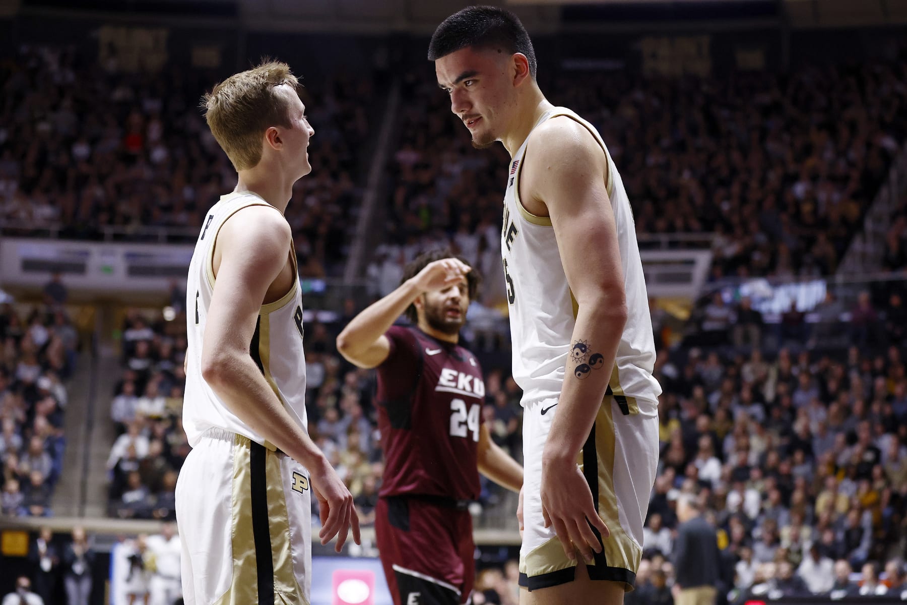 WEST LAFAYETTE, IN - DECEMBER 29: Purdue Boilermakers center Zach Edey (15) talks with Purdue Boilermakers guard Fletcher Loyer (2) during a mens college basketball game between Eastern Kentucky Colonels and the Purdue Boilermakers on December 29th, 2023 at Mackey Arena, in West Lafayette, IN.  (Photo by Jeffrey Brown/Icon Sportswire via Getty Images)