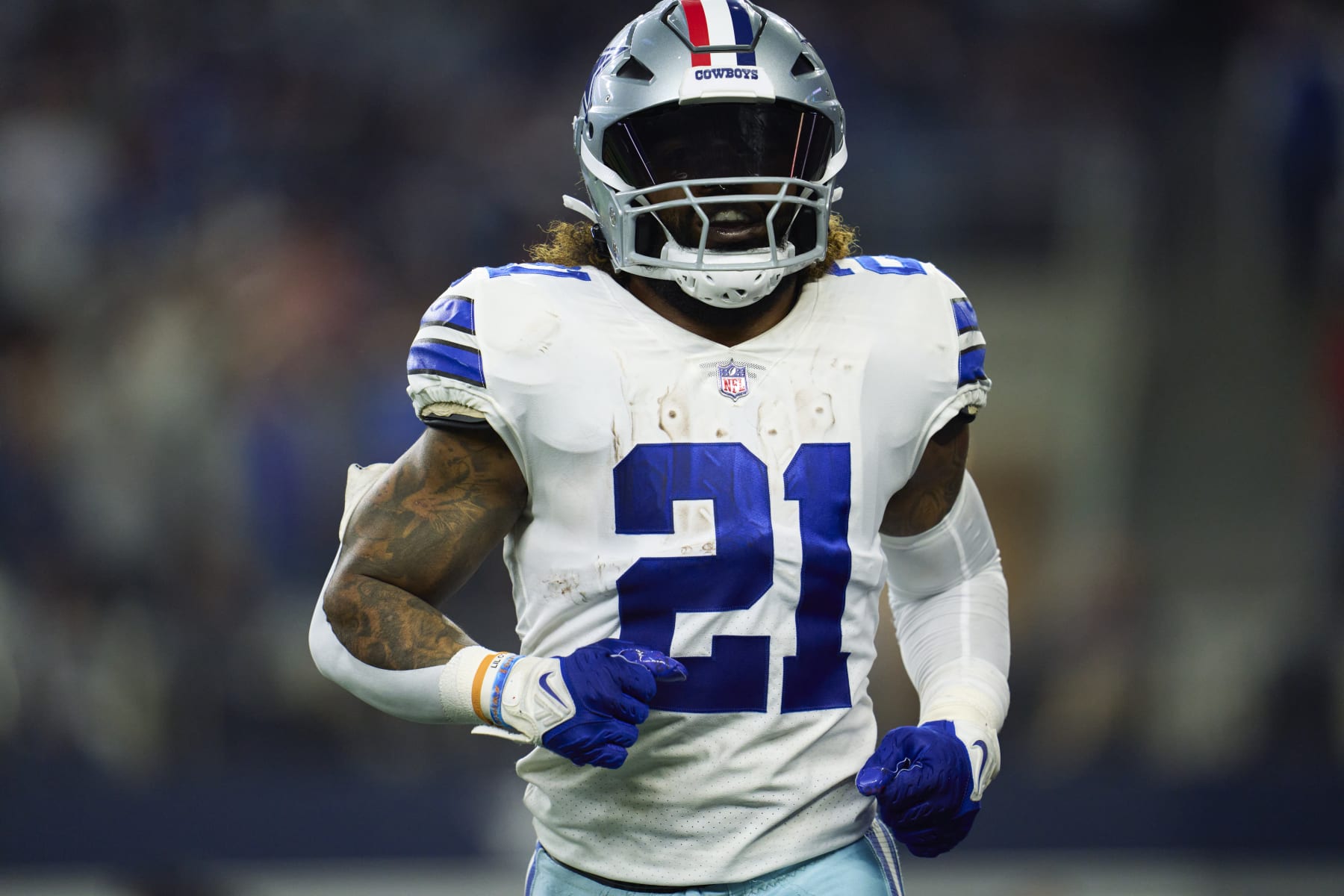 ARLINGTON, TX - DECEMBER 04: Ezekiel Elliott #21 of the Dallas Cowboys celebrates after a touchdown against the Indianapolis Colts during the second half at AT&T Stadium on December 4, 2022 in Arlington, Texas. (Photo by Cooper Neill/Getty Images)