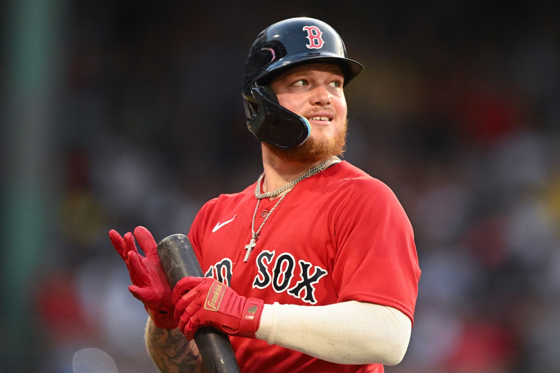 BOSTON, MASSACHUSETTS - JULY 06: Alex Verdugo #99 of the Boston Red Sox walks off the field after hitting a pop fly to right field to end the second inning against the Texas Rangers at Fenway Park on July 06, 2023 in Boston, Massachusetts. (Photo by Brian Fluharty/Getty Images)