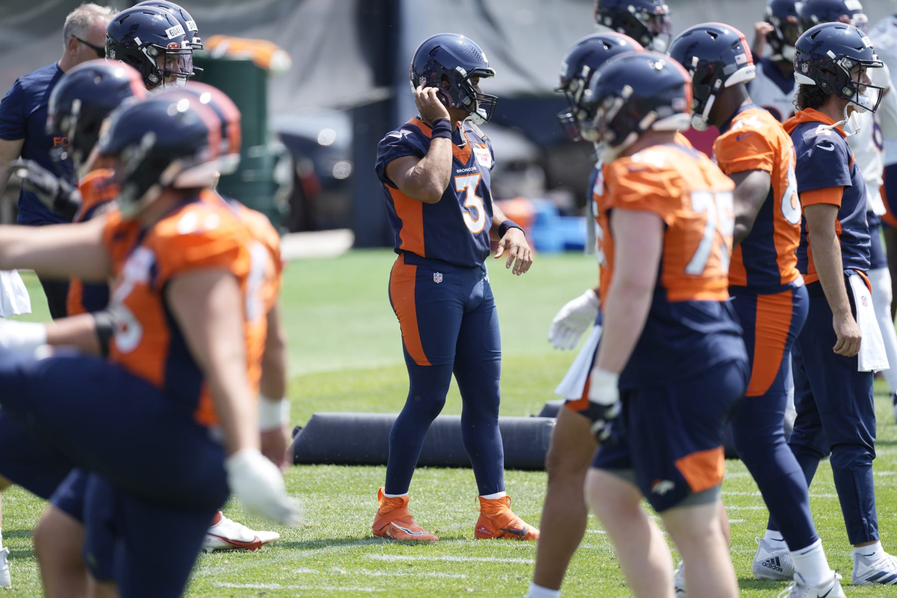 Denver Broncos quarterback Russell Wilson (3) takes part in drills during a mandatory NFL football minicamp at the Broncos' headquarters Wednesday, June 14, 2023, in Centennial, Colo. (AP Photo/David Zalubowski)