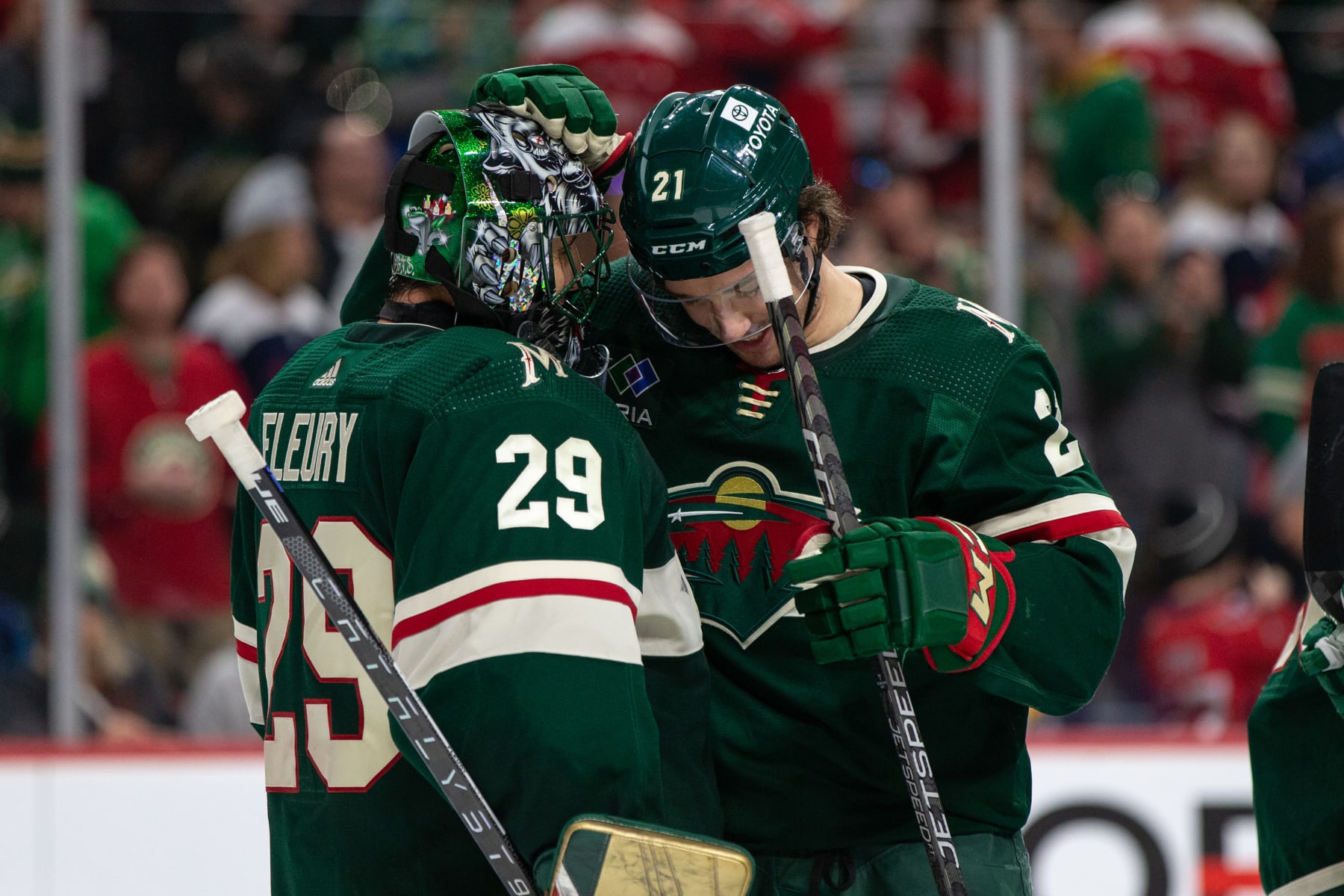 SAINT PAUL, MN - MARCH 19: Minnesota Wild goaltender Marc-Andre Fleury (29) celebrates a win with Minnesota Wild right wing Brandon Duhaime (21) after the NHL game between the Washington Capitals and Minnesota Wild, on March 19th, 2023, at the Xcel Energy Center in Saint Paul, MN. (Photo by Bailey Hillesheim/Icon Sportswire via Getty Images) SAINT PAUL, MN - MARCH 19: Minnesota Wild goaltender Marc-Andre Fleury (29) celebrates a win with Minnesota Wild right wing Brandon Duhaime (21) after the NHL game between the Washington Capitals and Minnesota Wild, on March 19th, 2023, at the Xcel Energy Center in Saint Paul, MN. (Photo by Bailey Hillesheim/Icon Sportswire via Getty Images)