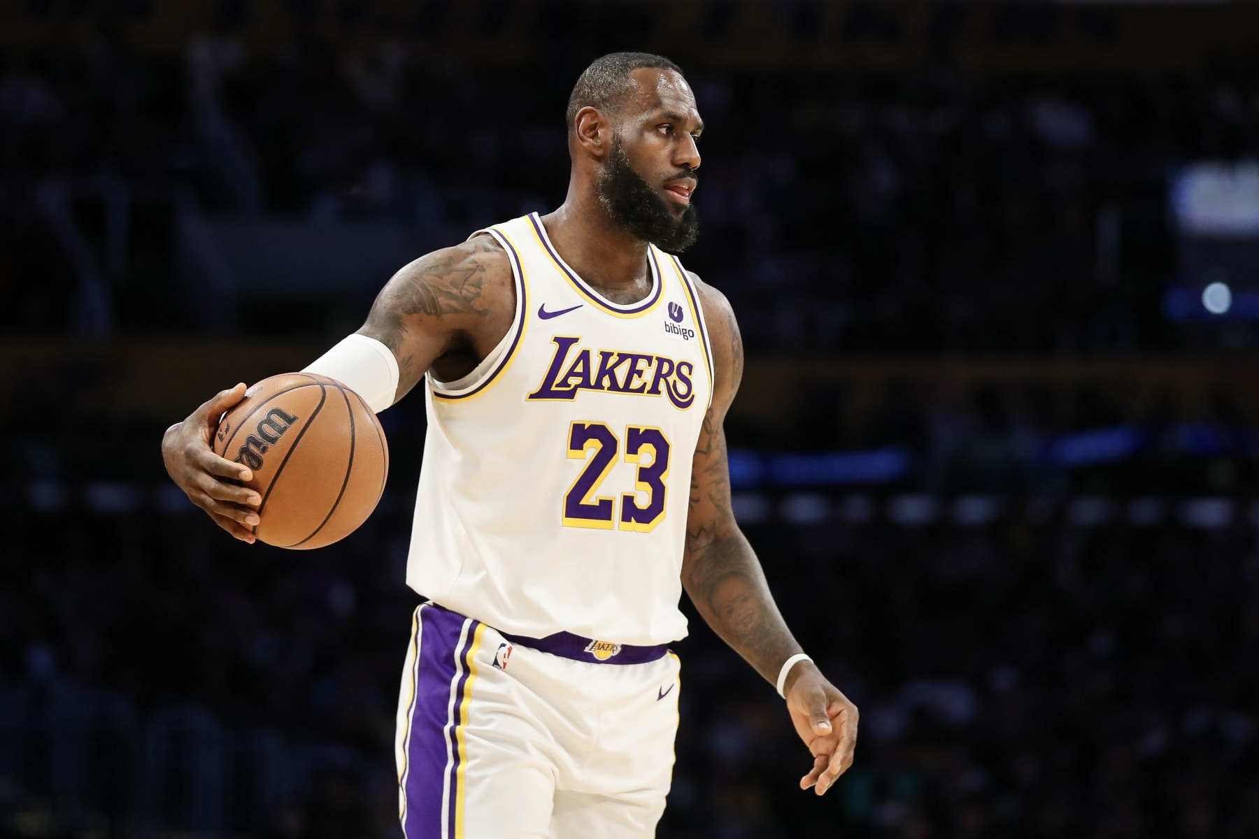 LOS ANGELES, CALIFORNIA - JANUARY 07: LeBron James #23 of the Los Angeles Lakers handles the ball in the second quarter against the LA Clippers at Crypto.com Arena on January 07, 2024 in Los Angeles, California. NOTE TO USER: User expressly acknowledges and agrees that, by downloading and or using this photograph, User is consenting to the terms and conditions of the Getty Images License Agreement. (Photo by Meg Oliphant/Getty Images)