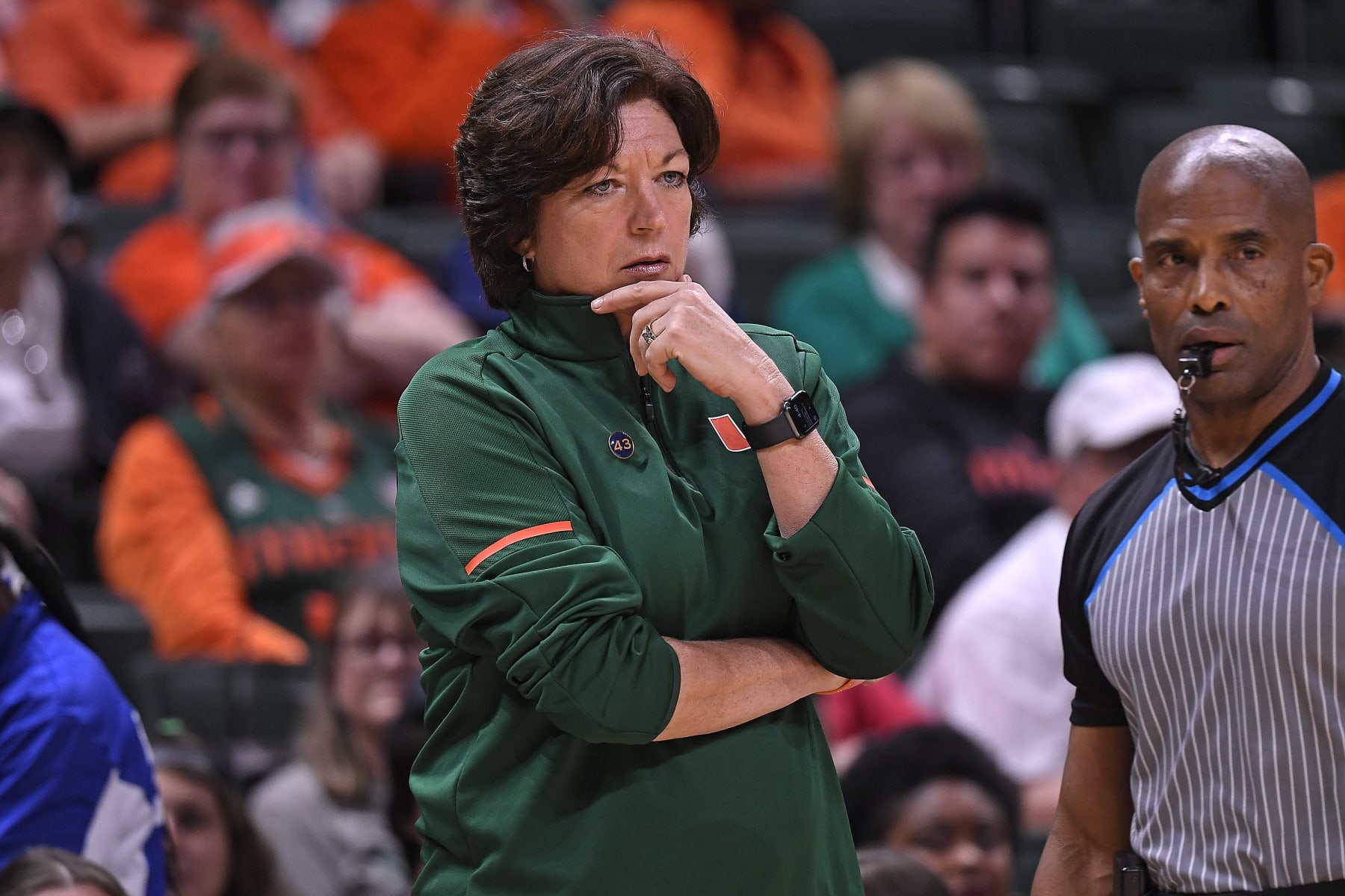 CORAL GABLES, FL - DEC 11: Miami Head Coach Katie Meier watches her players in the first half as the Miami Hurricanes faced the Florida Gators on December 11, 2022, at the Watsco Center in Coral Gables, Florida. (Photo by Samuel Lewis/Icon Sportswire via Getty Images)