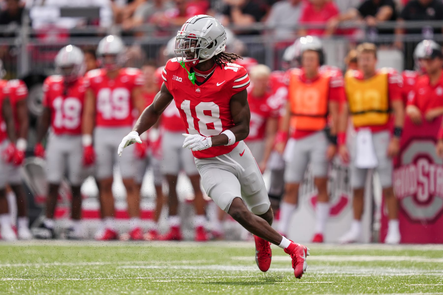 COLUMBUS, OHIO - SEPTEMBER 16: Marvin Harrison Jr. #18 of the Ohio State Buckeyes runs a route in the first quarter against the Western Kentucky Hilltoppers at Ohio Stadium on September 16, 2023 in Columbus, Ohio. (Photo by Dylan Buell/Getty Images)