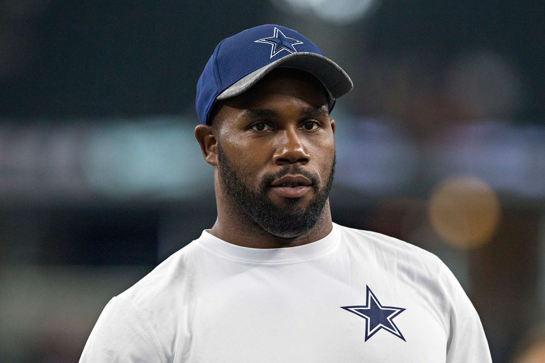 ARLINGTON, TX - SEPTEMBER 1:  Darren McFadden #20 of the Dallas Cowboys who is not dressed out helps the team warm up before a preseason game against the Houston Texans at AT&T Stadium on September 1, 2016 in Arlington, Texas.  The Texans defeated the Cowboys 28-17.  (Photo by Wesley Hitt/Getty Images)