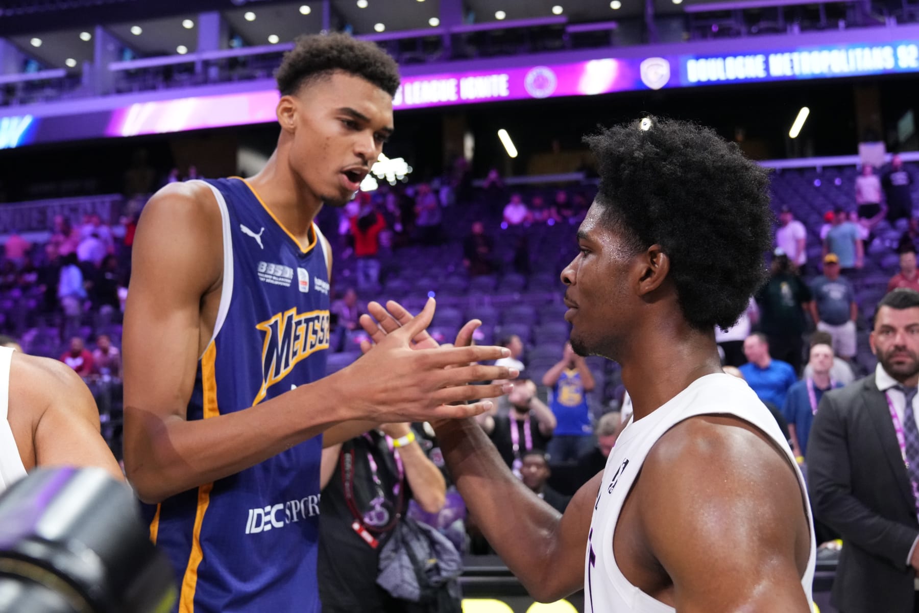 HENDERSON, NEVADA - OCTOBER 04:  (L-R) Victor Wembanyama #1 of Boulogne-Levallois Metropolitans 92 interacts with Scoot Henderson #0 of G League Ignite after their preseason game at The Dollar Loan Center on October 4, 2022 in Henderson, Nevada (Photo by Chris Unger for The Washington Post via Getty Images)