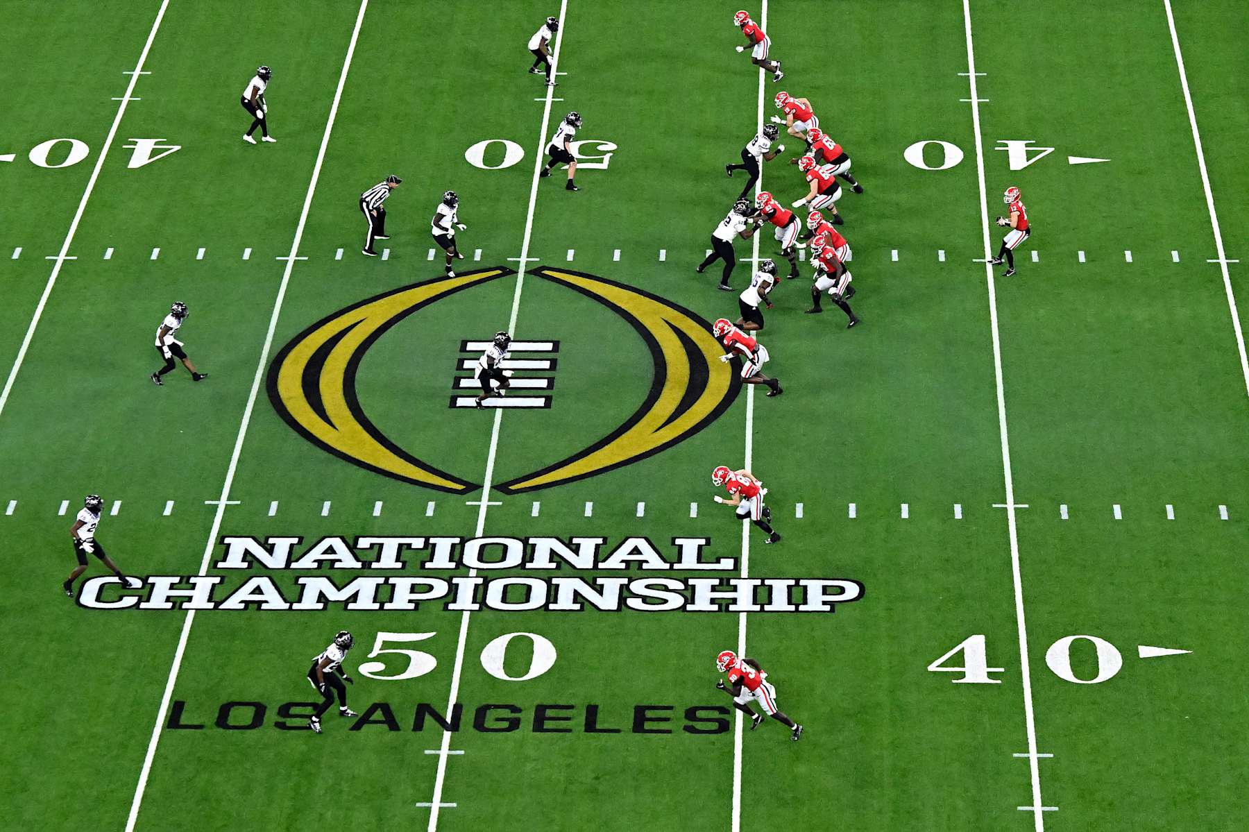 INGLEWOOD, CALIFORNIA - JANUARY 09: A view of the National Championship logo on the field as the Georgia Bulldogs run a play against the TCU Horned Frogs in the College Football Playoff National Championship game at SoFi Stadium on January 09, 2023 in Inglewood, California. (Photo by Kevork Djansezian/Getty Images)