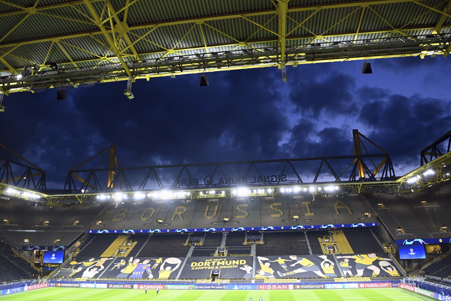 Players warm up before the Champions League quarterfinal second leg soccer match between Borussia Dortmund and Manchester City at the Signal Iduna Park stadium in Dortmund, Germany, Wednesday, April 14, 2021. (Federico Gambarini/Pool via AP)