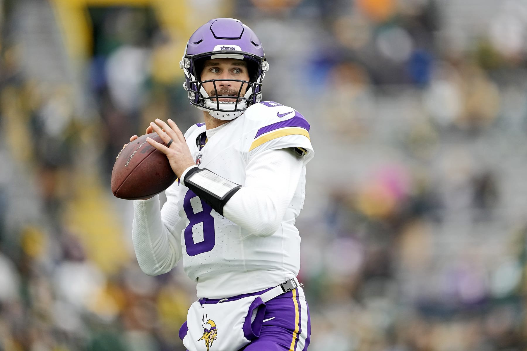 GREEN BAY, WISCONSIN - OCTOBER 29: Kirk Cousins #8 of the Minnesota Vikings warms up prior to a game against the Green Bay Packers at Lambeau Field on October 29, 2023 in Green Bay, Wisconsin. (Photo by Patrick McDermott/Getty Images)