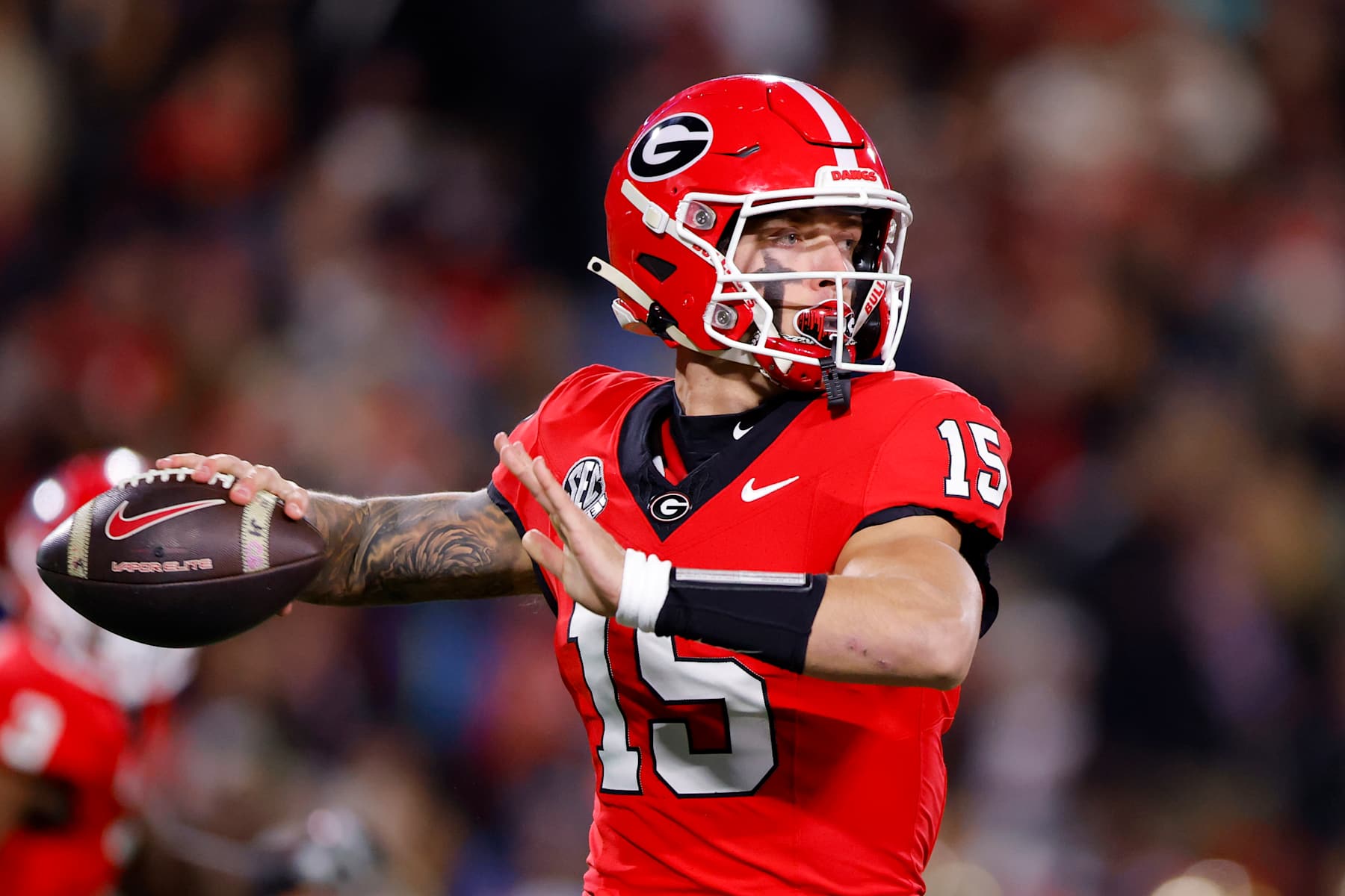 ATHENS, GEORGIA - NOVEMBER 29: Carson Beck #15 of the Georgia Bulldogs passes during the first quarter against the Georgia Tech Yellow Jackets at Sanford Stadium on November 29, 2024 in Athens, Georgia. (Photo by Todd Kirkland/Getty Images) ATHENS, GEORGIA - NOVEMBER 29: Carson Beck #15 of the Georgia Bulldogs passes during the first quarter against the Georgia Tech Yellow Jackets at Sanford Stadium on November 29, 2024 in Athens, Georgia. (Photo by Todd Kirkland/Getty Images)