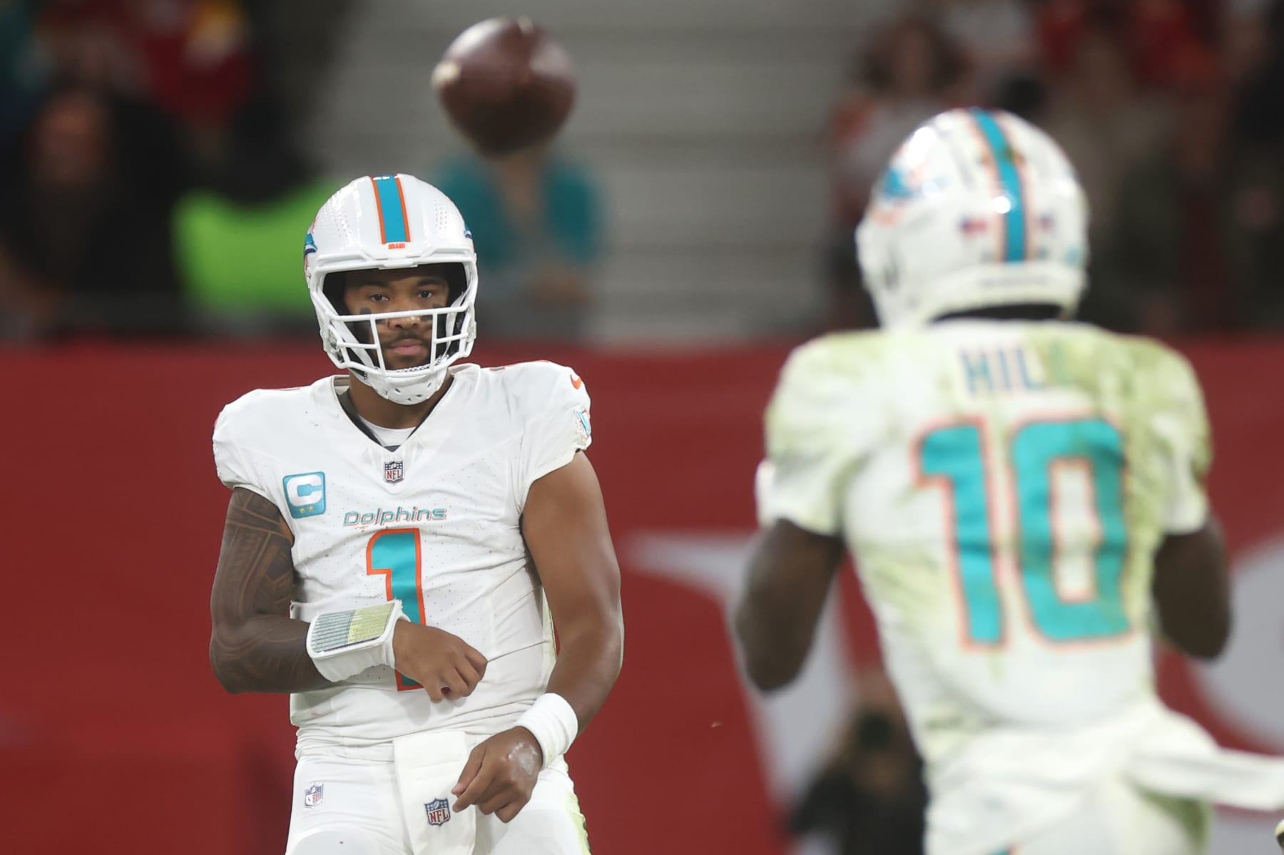 FRANKFURT AM MAIN, GERMANY - NOVEMBER 05: Tua Tagovailoa #1 of the Miami Dolphins passes to Tyreek Hill #10 of the Miami Dolphins in the first quarter during the NFL match between Miami Dolphins and Kansas City Chiefs at Deutsche Bank Park on November 05, 2023 in Frankfurt am Main, Germany. (Photo by Alex Grimm/Getty Images)