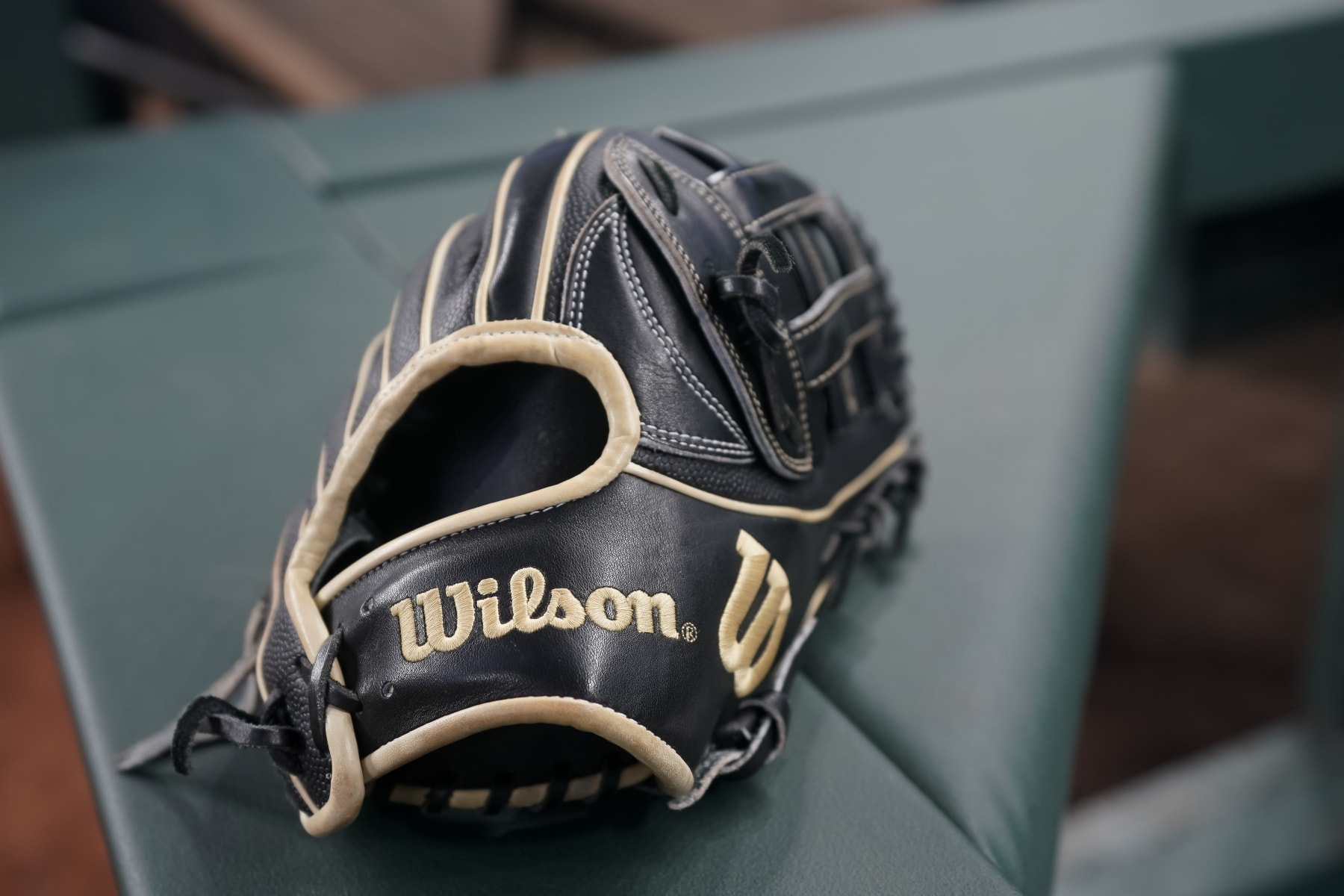 ARLINGTON, TEXAS - SEPTEMBER 22: A detail view of a Wilson baseball glove is shown before the game between the Texas Rangers and the Seattle Mariners at Globe Life Field on September 22, 2023 in Arlington, Texas. (Photo by Sam Hodde/Getty Images)