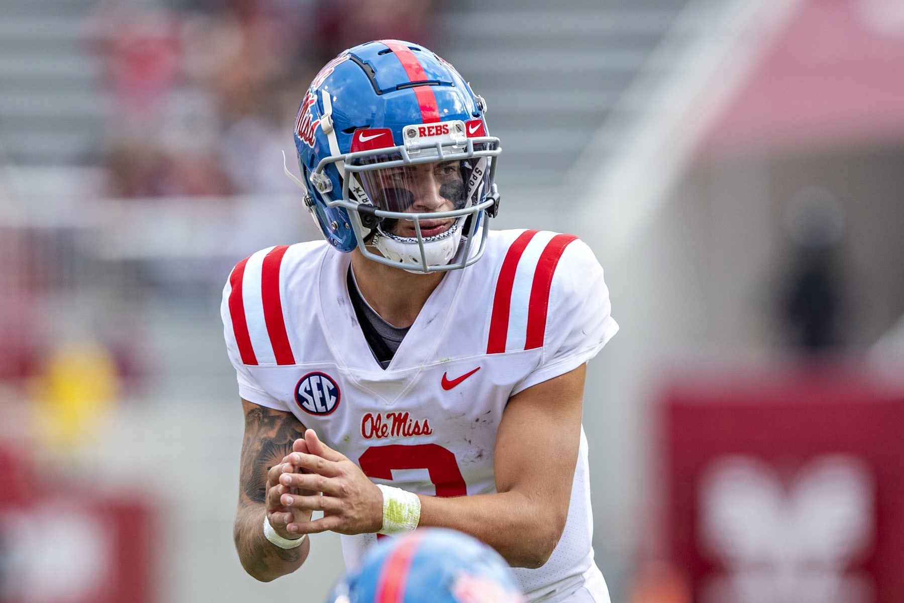 FAYETTEVILLE, AR - OCTOBER 17:    Matt Corral #2 of the Mississippi Rebels at the line of scrimmage during a game against the Arkansas Razorbacks at Razorback Stadium on October 17, 2020 in Fayetteville, Arkansas.  The Razorbacks defeated the Rebels 33-21.  (Photo by Wesley Hitt/Getty Images)